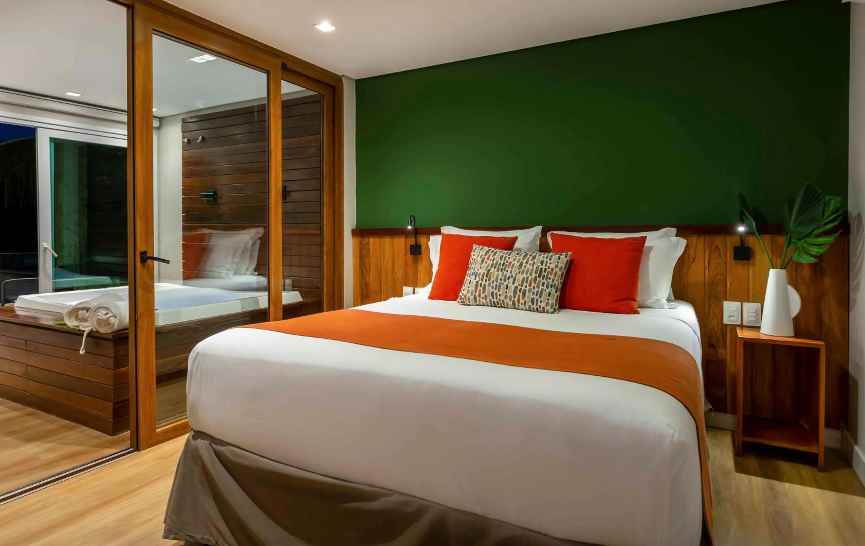 Bed in Pousada Bahia Tambor