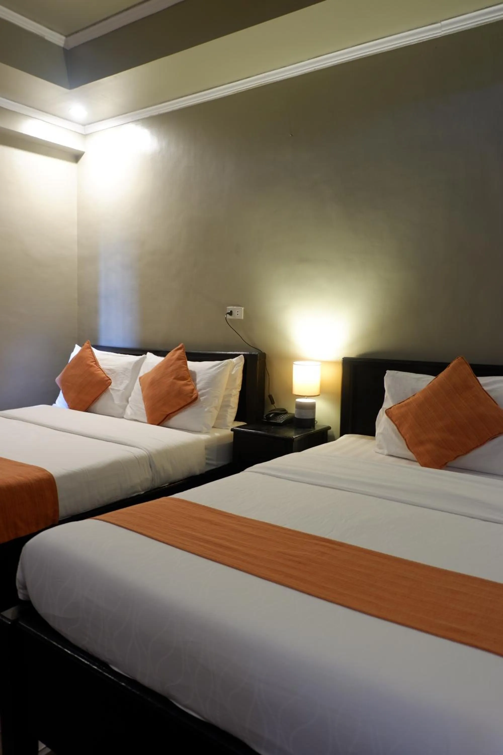 Bed in Vela Terraces Hotel