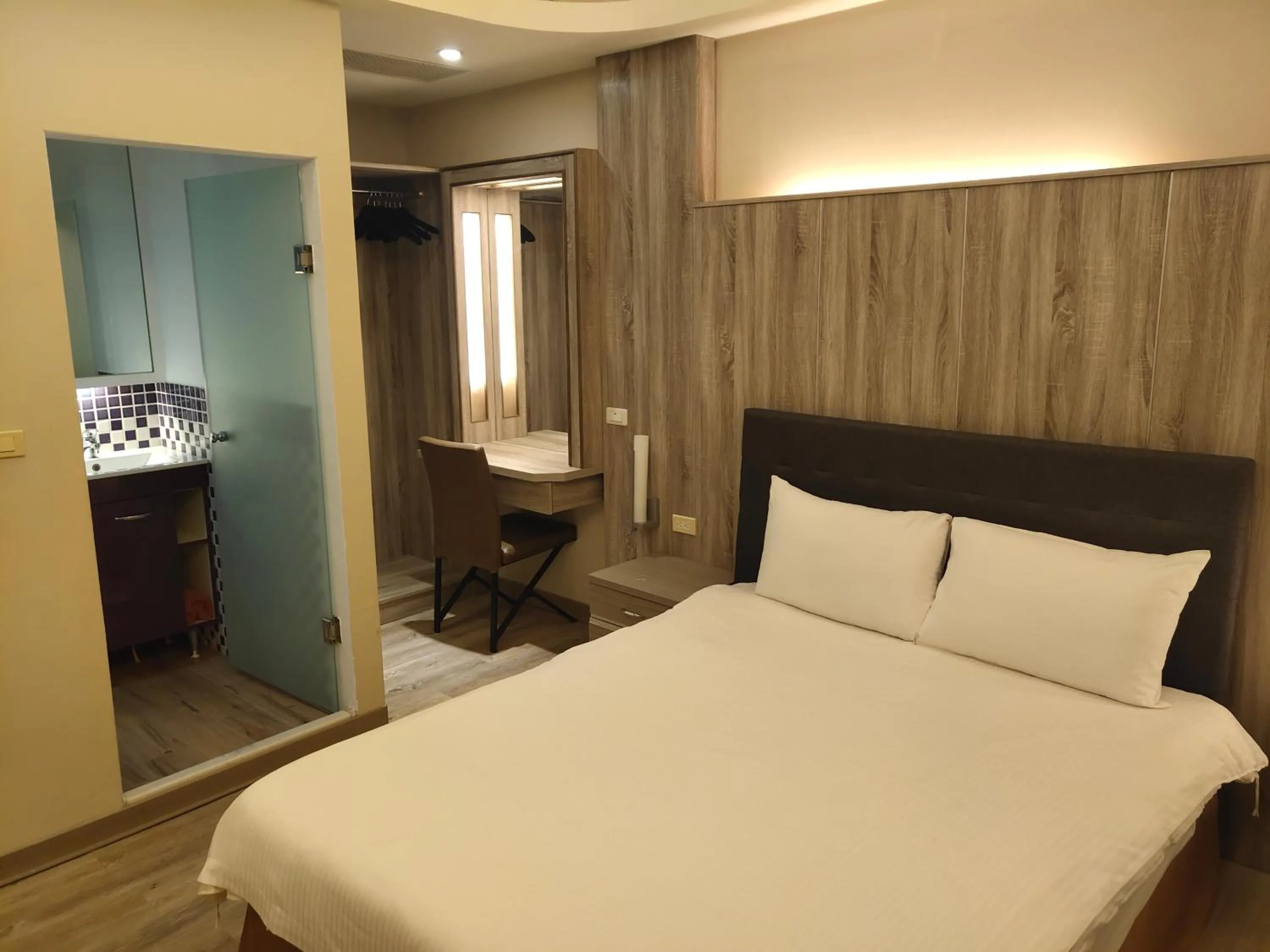 Bed in Empire Pacific Hotel龍潭科學園區 六福村 幼獅工業園區 長租旅居