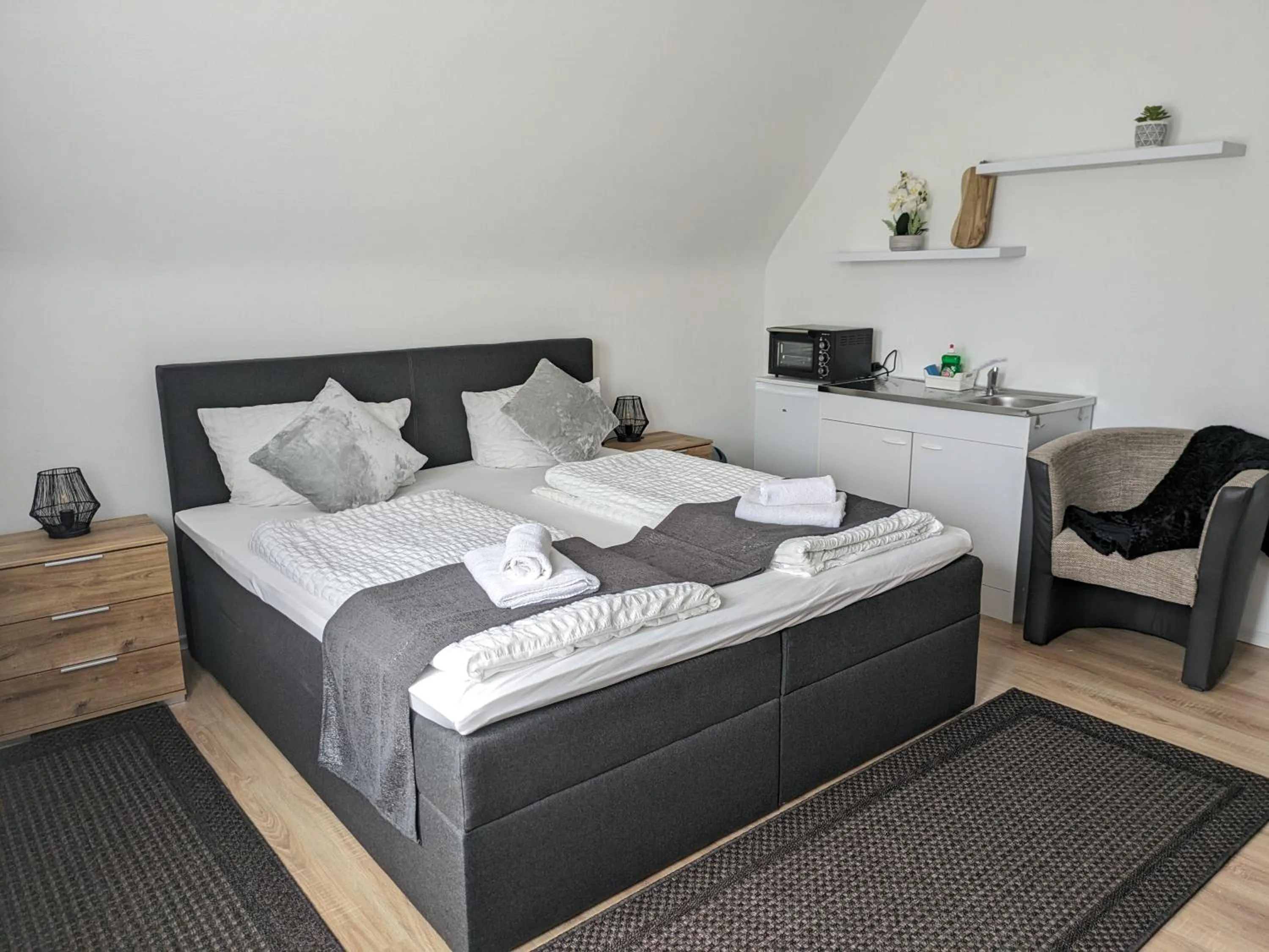 stove, Bed in Hotel Ari