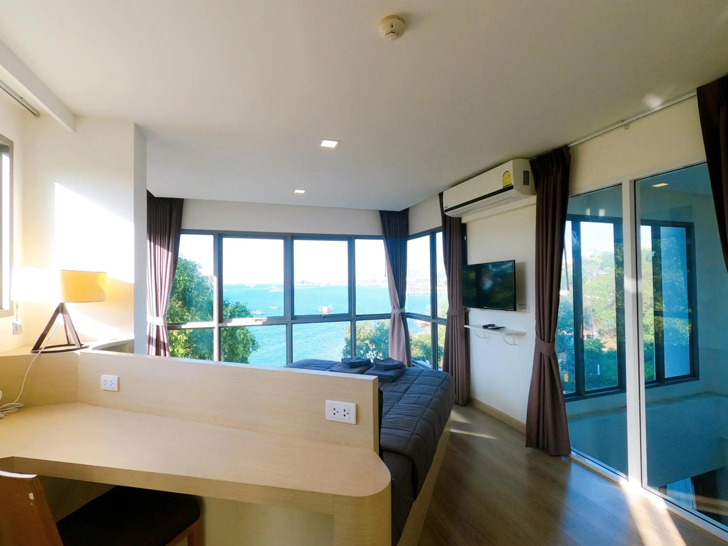 Bed in Sonrisa Srirachaที่พักติดทะเล