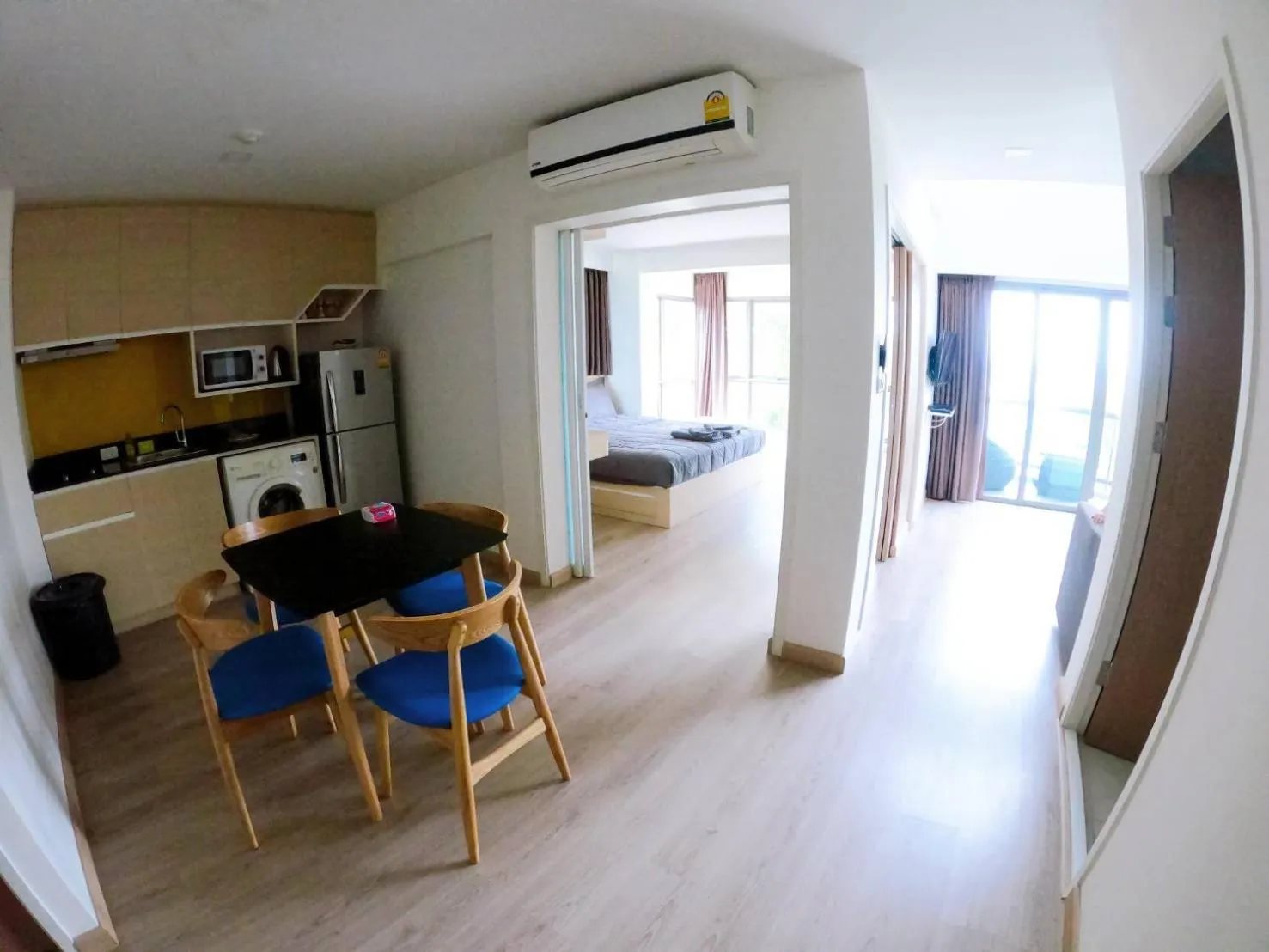 Kitchen or kitchenette in Sonrisa Srirachaที่พักติดทะเล