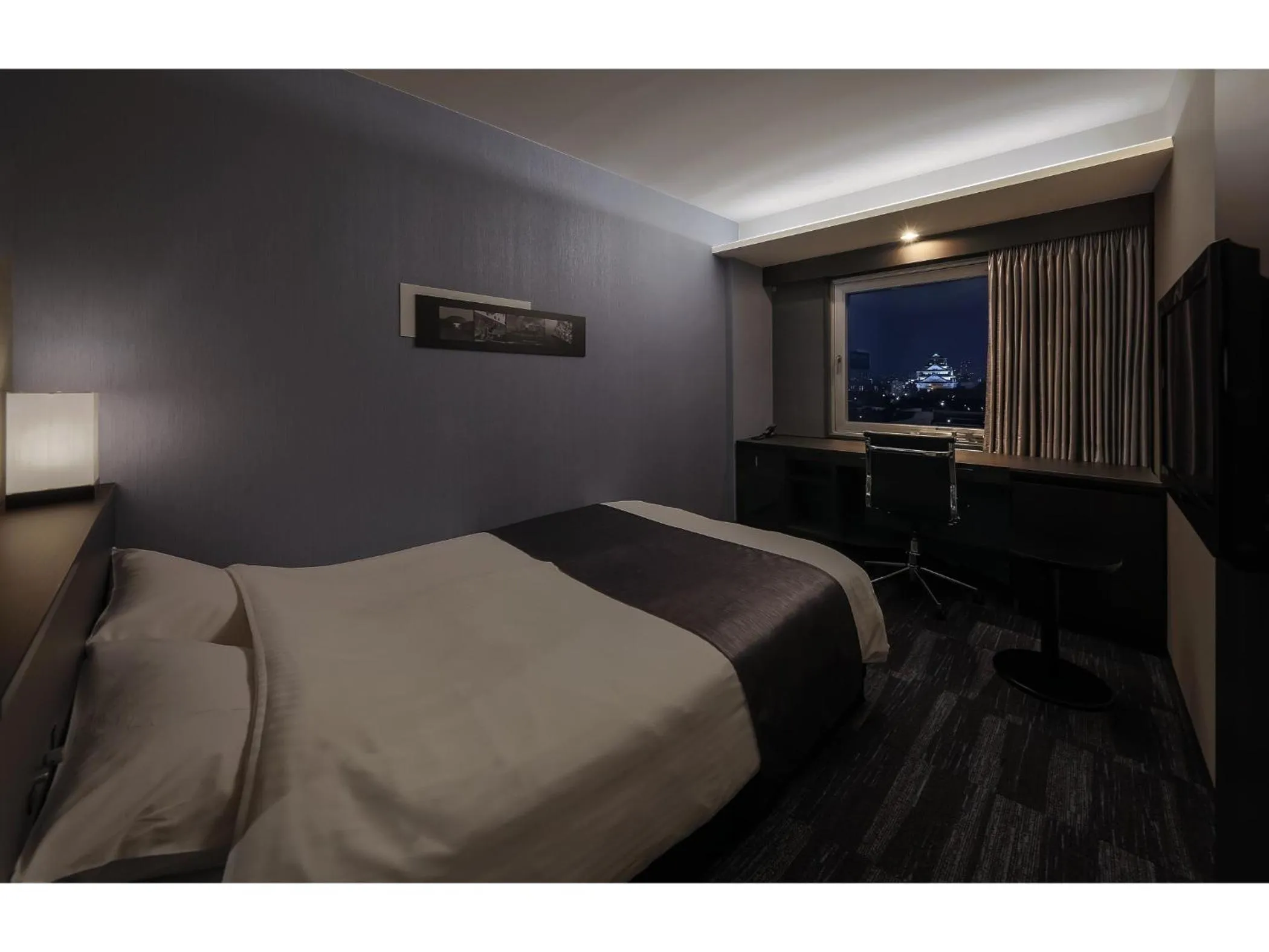 Bed in KKR Hotel Osaka