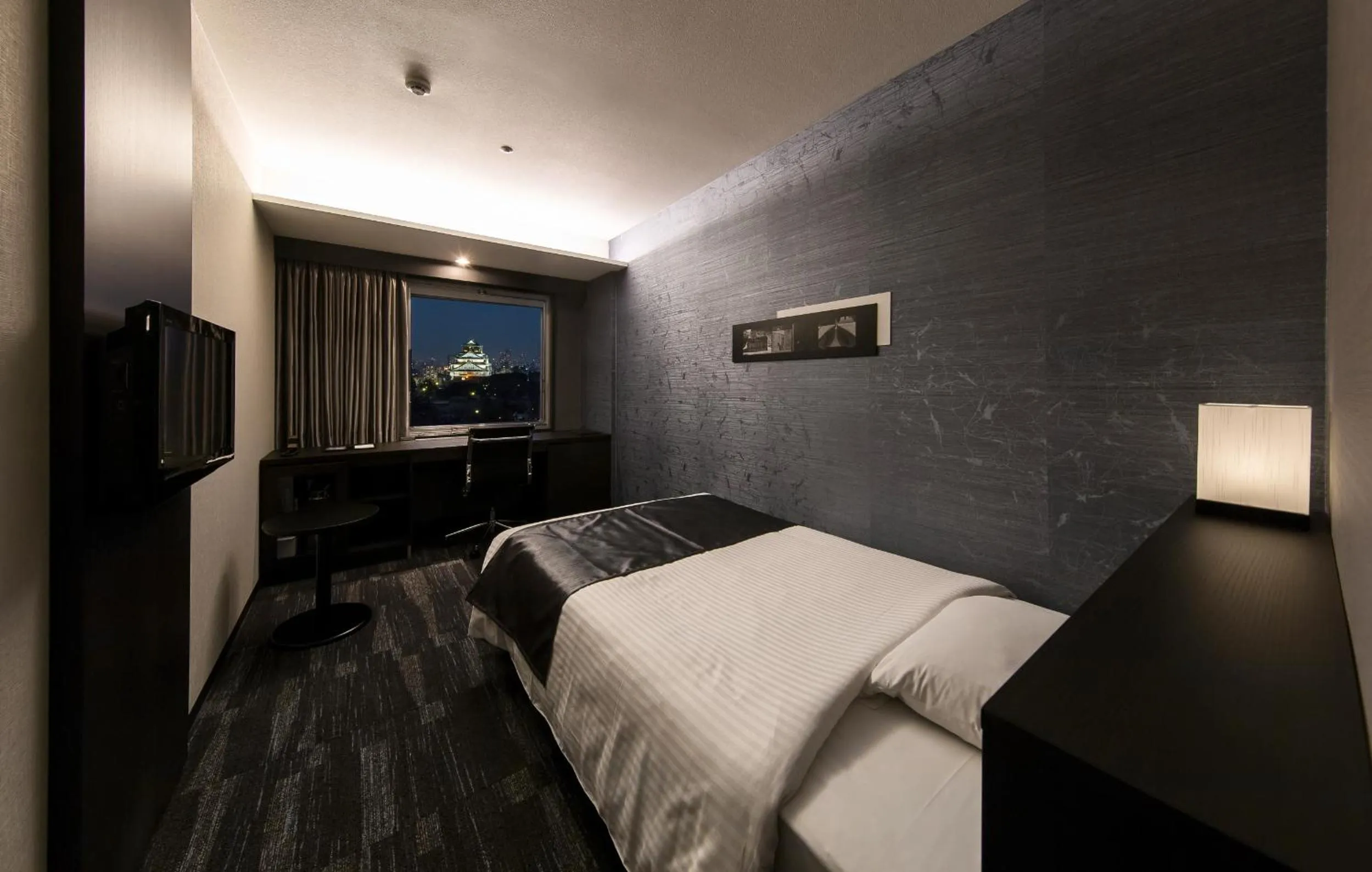 Bed in KKR Hotel Osaka