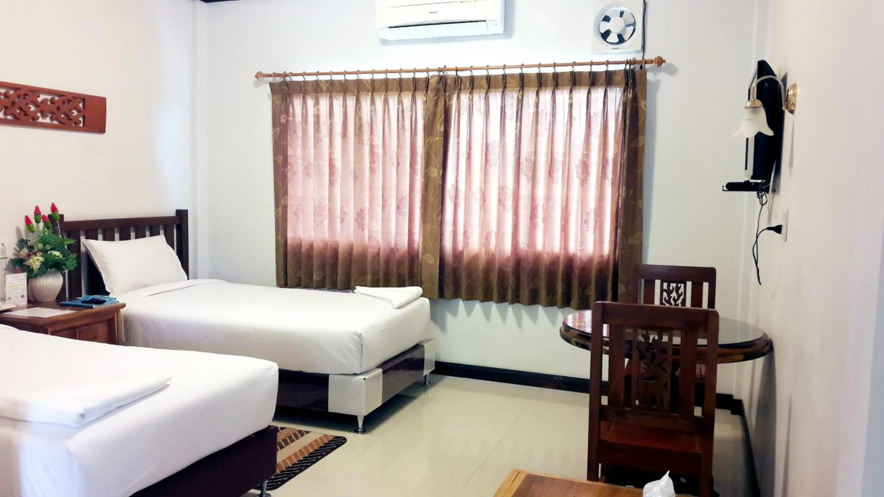 Bed in Khum Nakhon Hotel