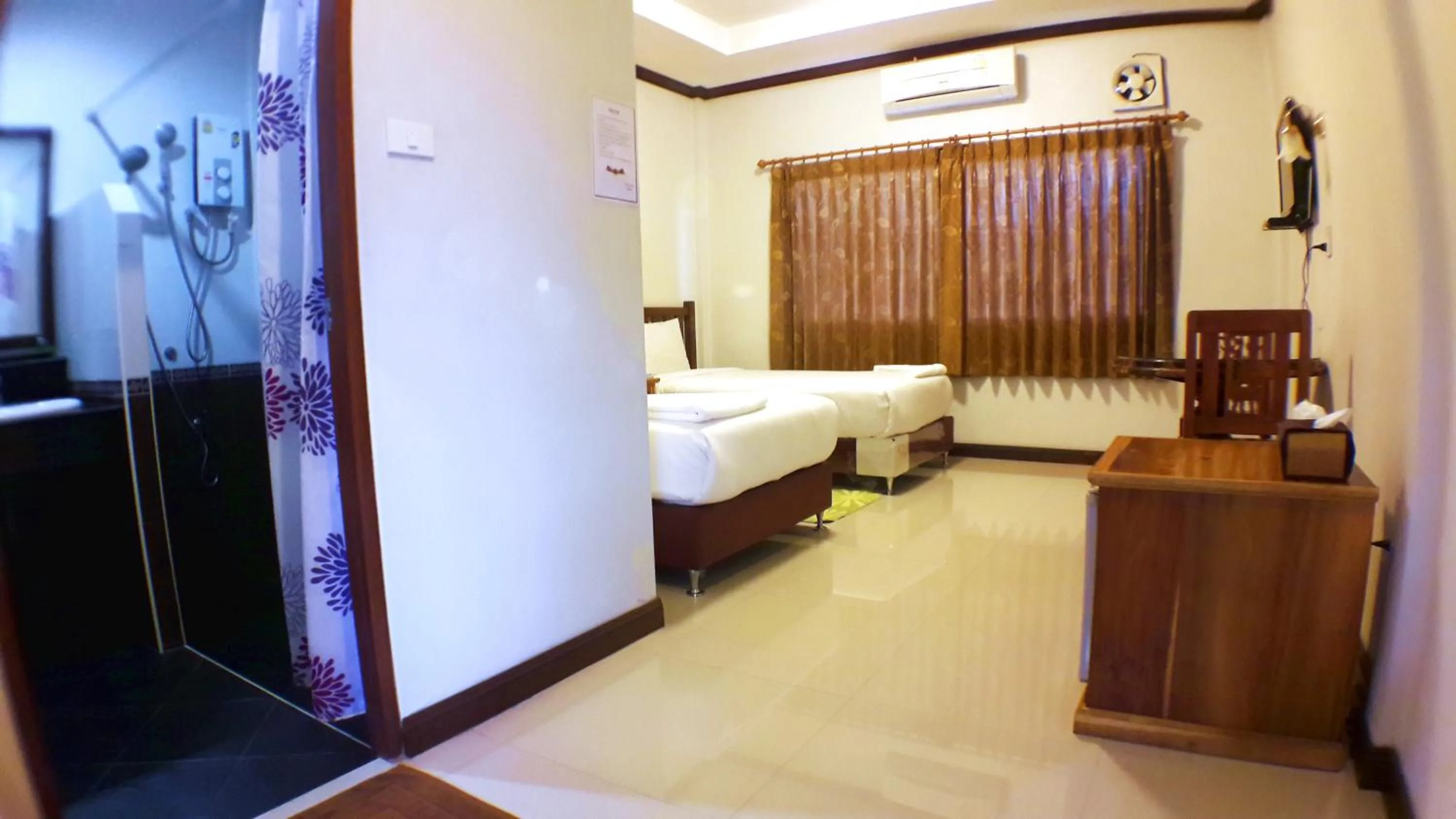 Bed in Khum Nakhon Hotel