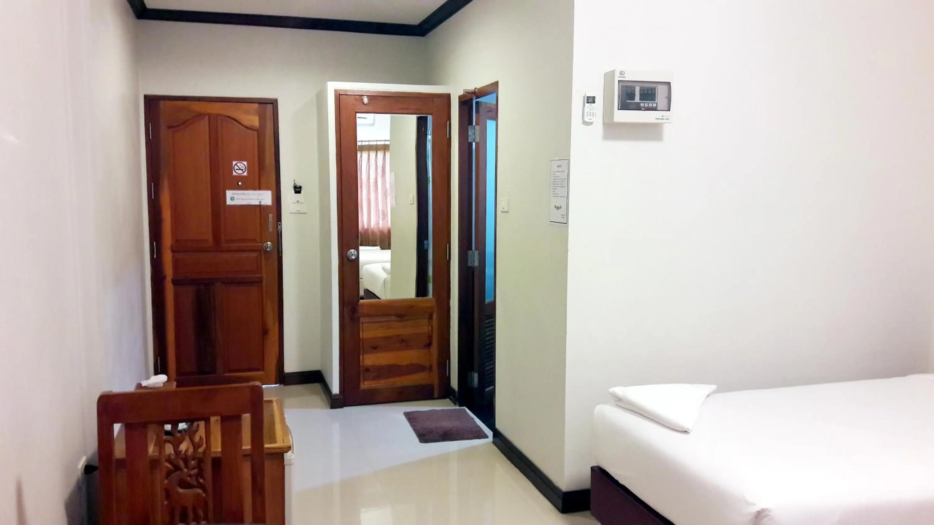 Bed in Khum Nakhon Hotel