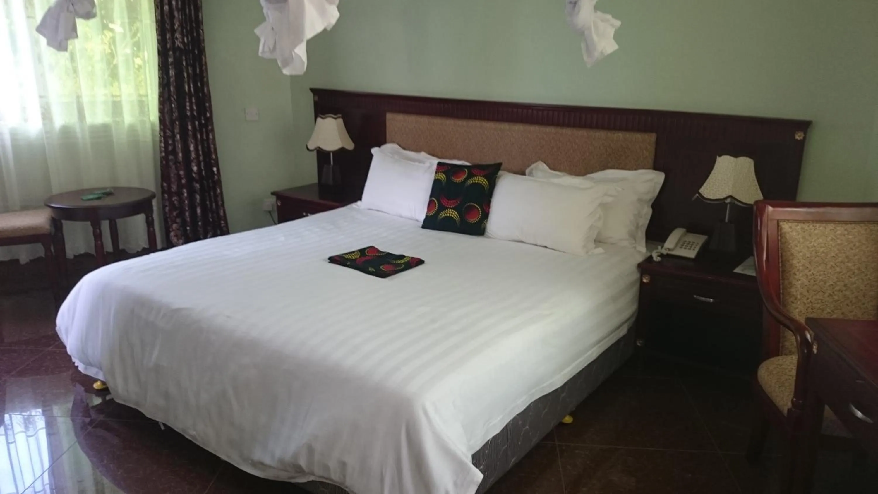 Bed in Asamar Country Resort