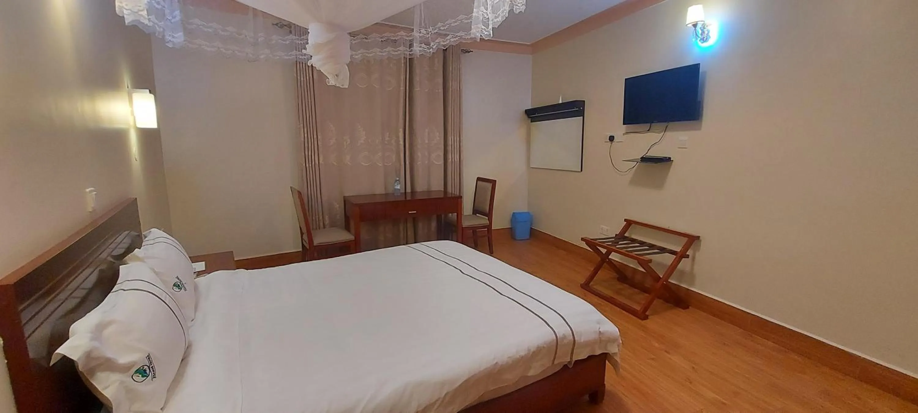 Communal lounge/ TV room in Asamar Country Resort