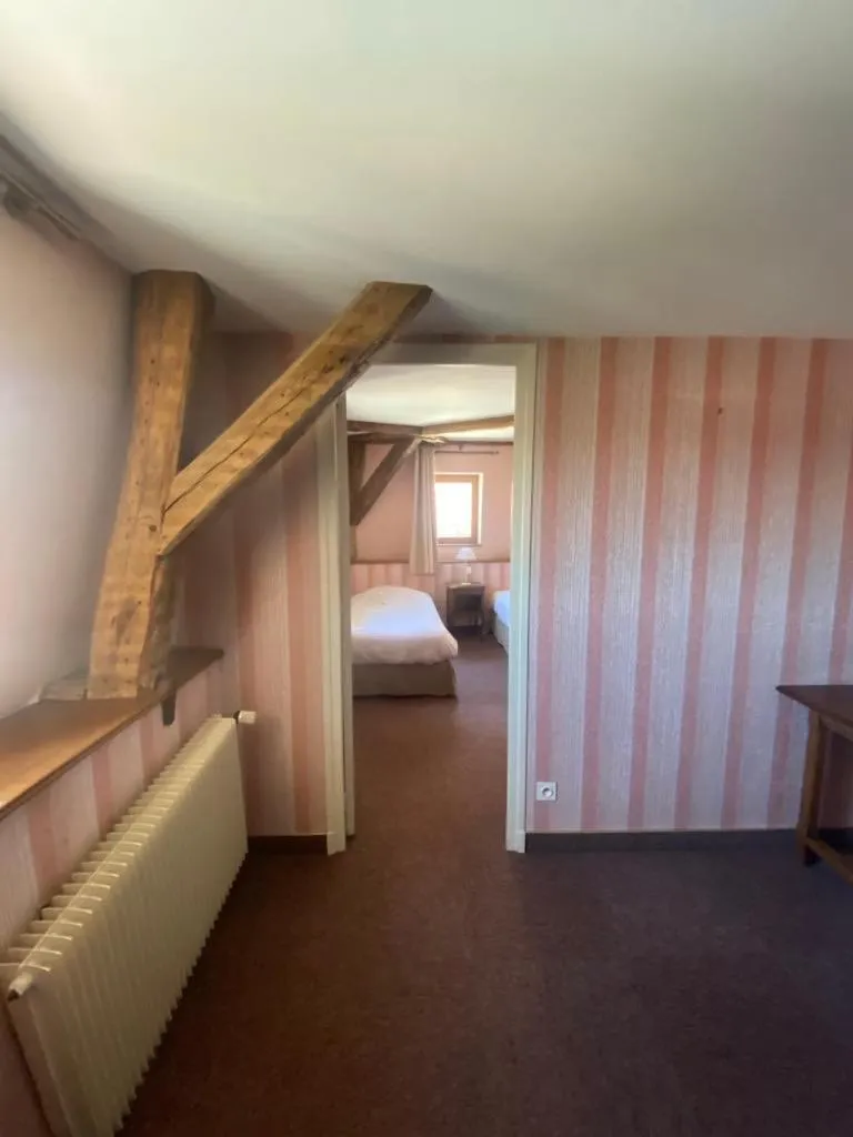 Bed in Hôtel des Cymaises