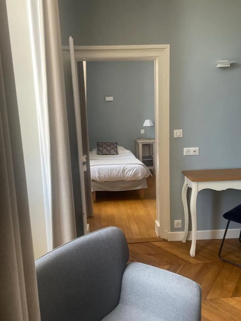 Bed in Hôtel des Cymaises