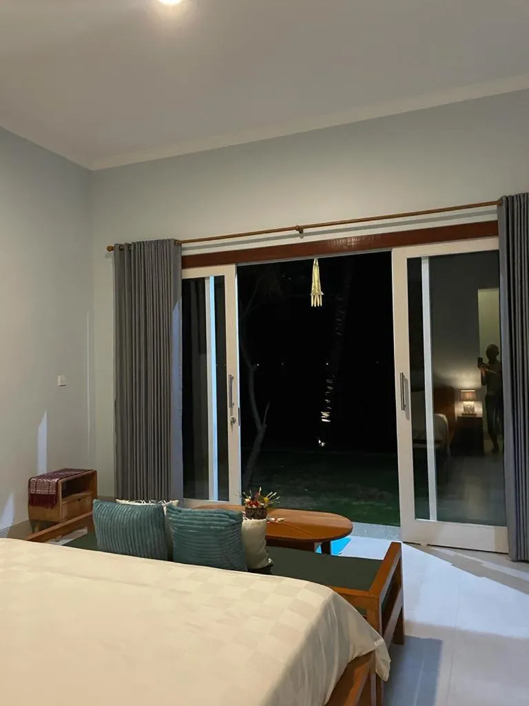 Bed in Mojito Beach Villas