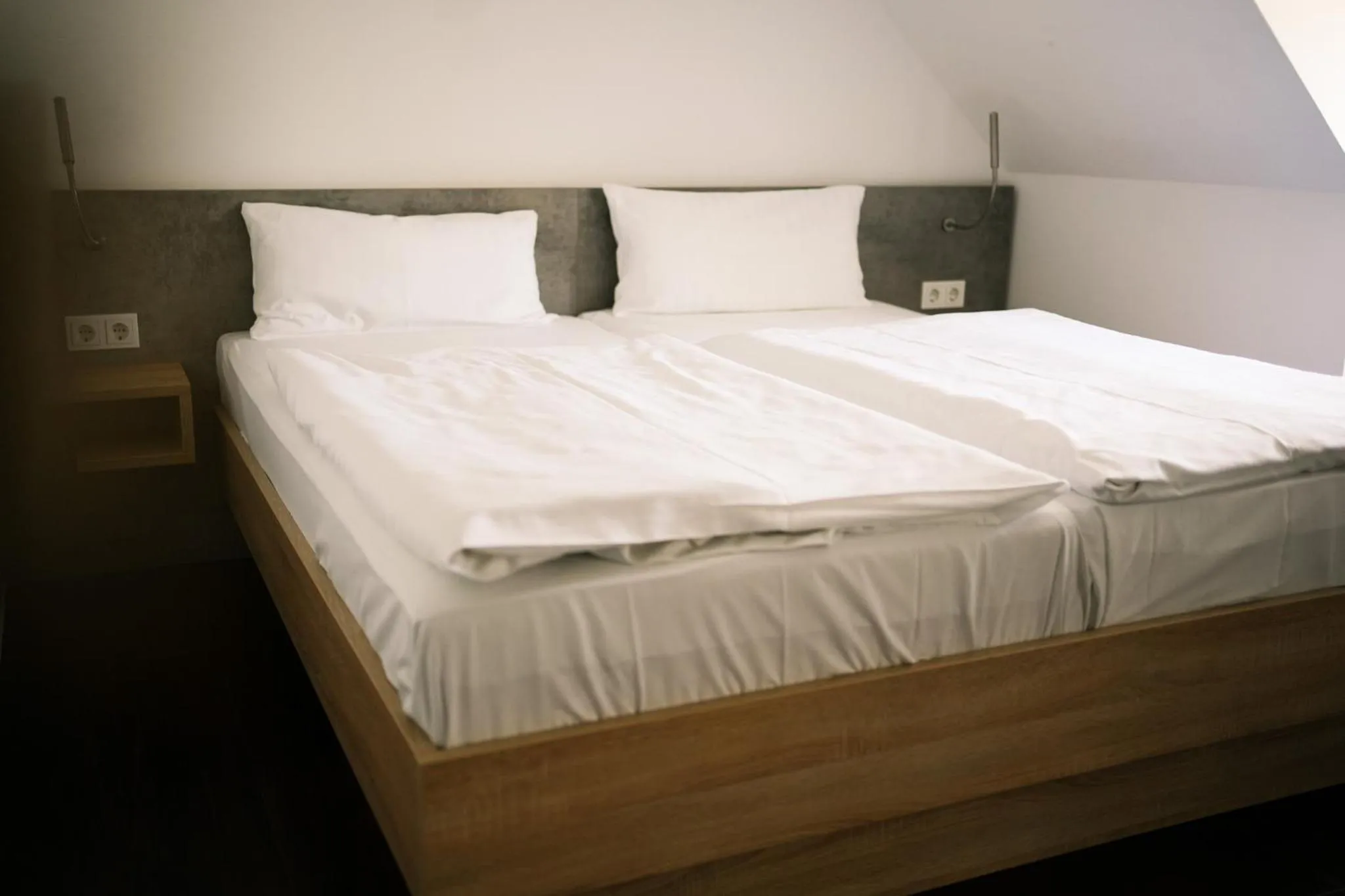 Bed in Hotel Stadt Kamen
