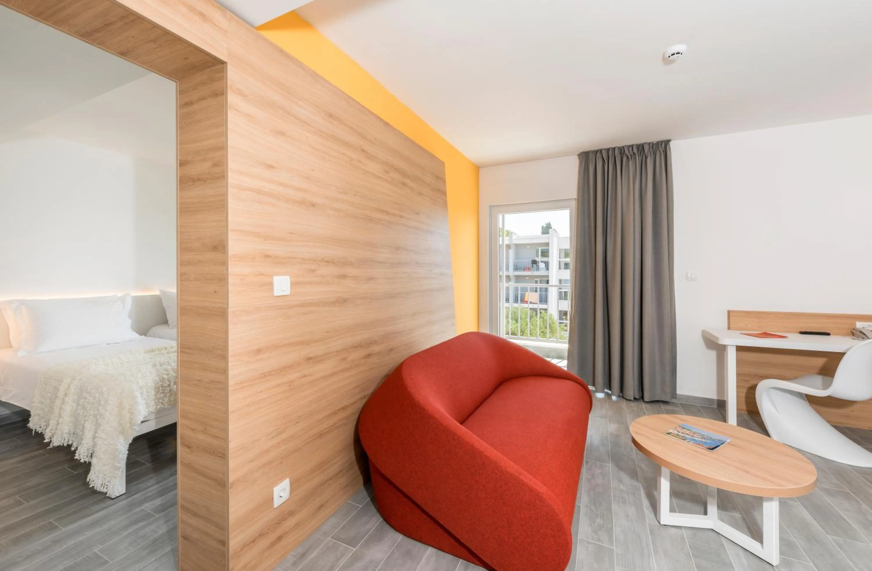 Living room, Bed in Pharos Hvar Bayhill Hotel