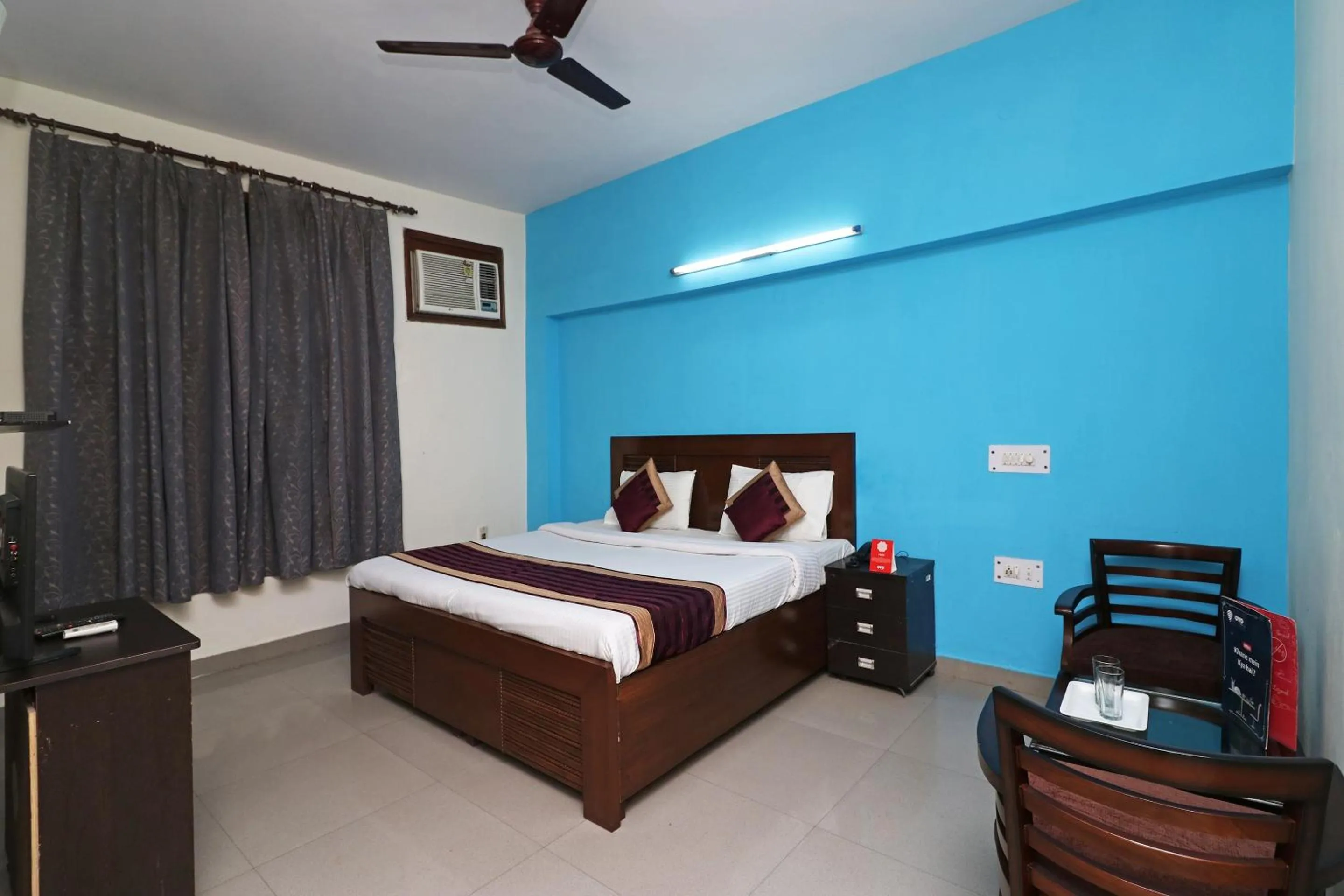 Bed in Hotel Akash Palace