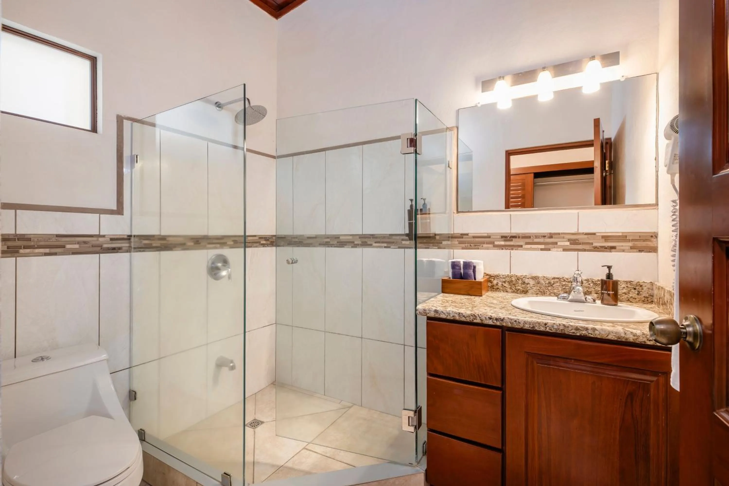 Shower in The Coast Beachfront Hotel