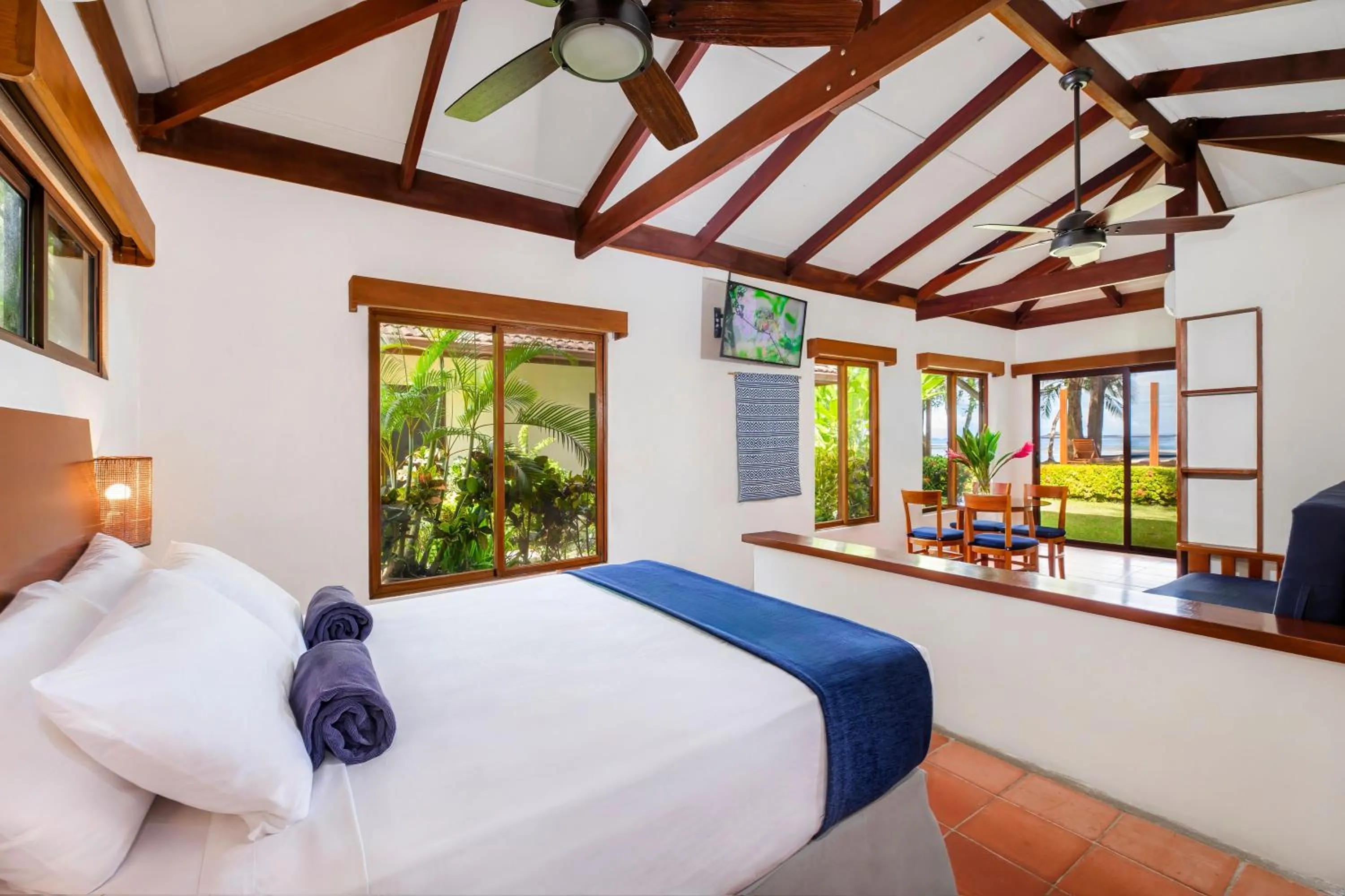 Bed in The Coast Beachfront Hotel