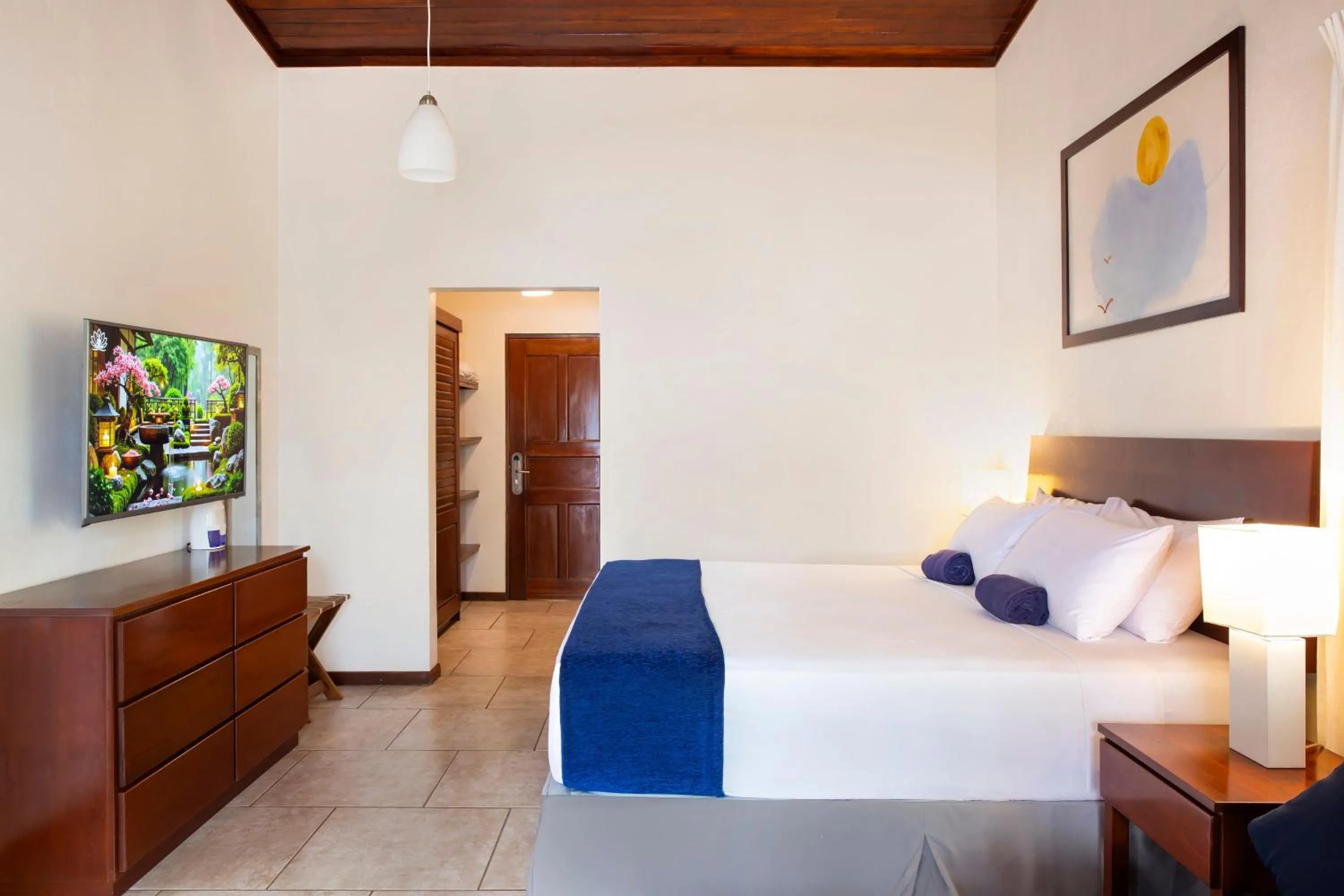 Bed in The Coast Beachfront Hotel