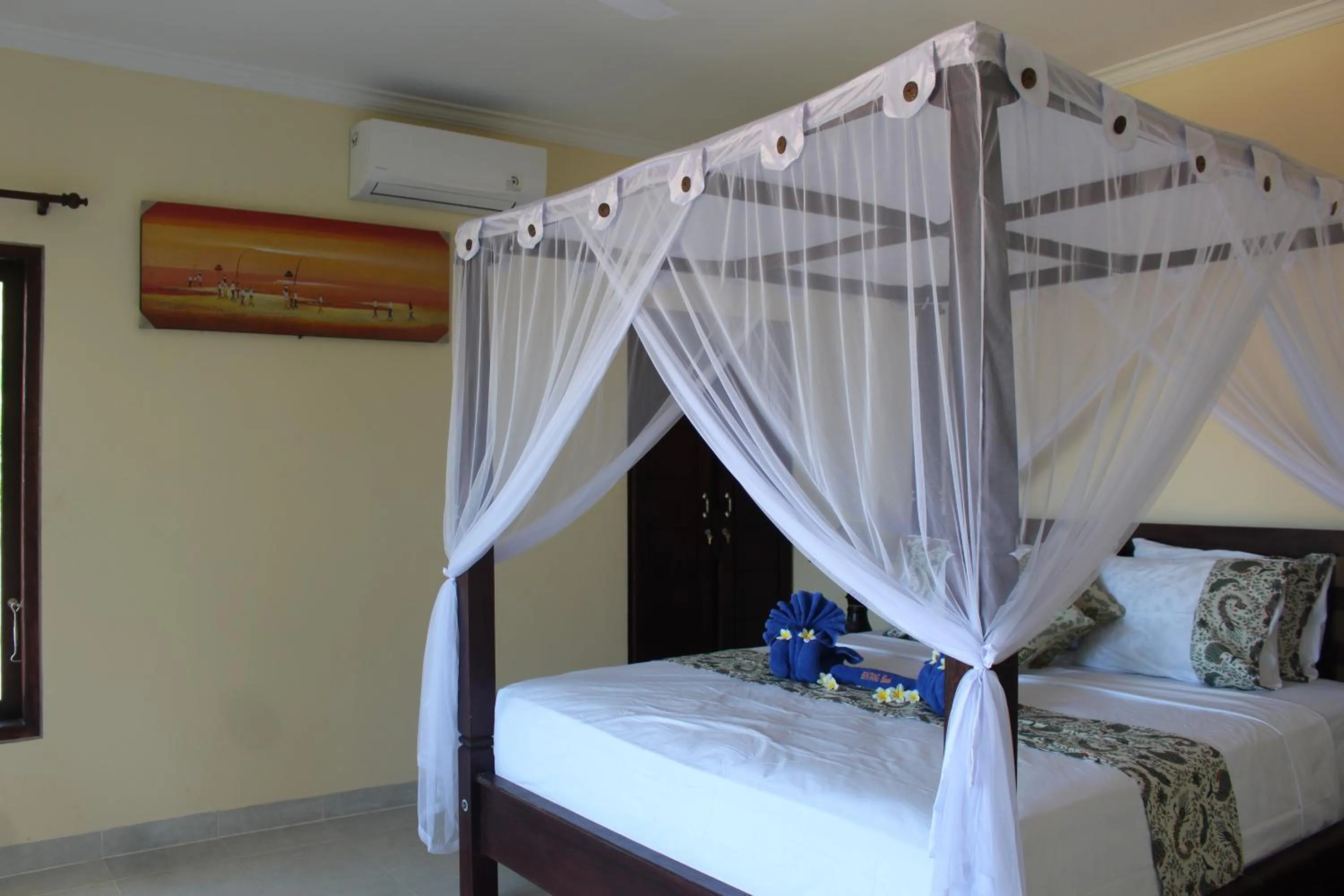 Bed in Bintang Beach Villa