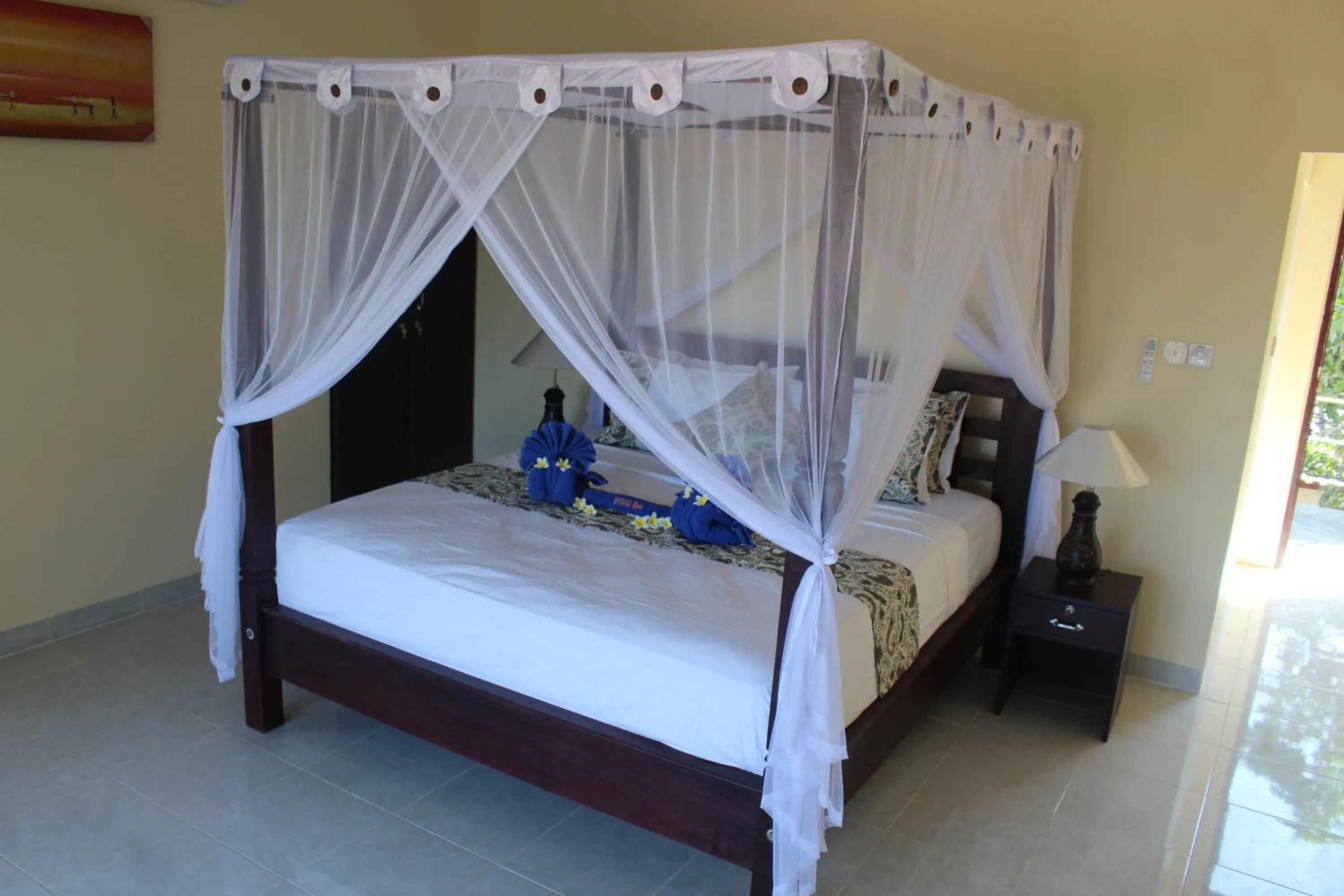 Bed in Bintang Beach Villa
