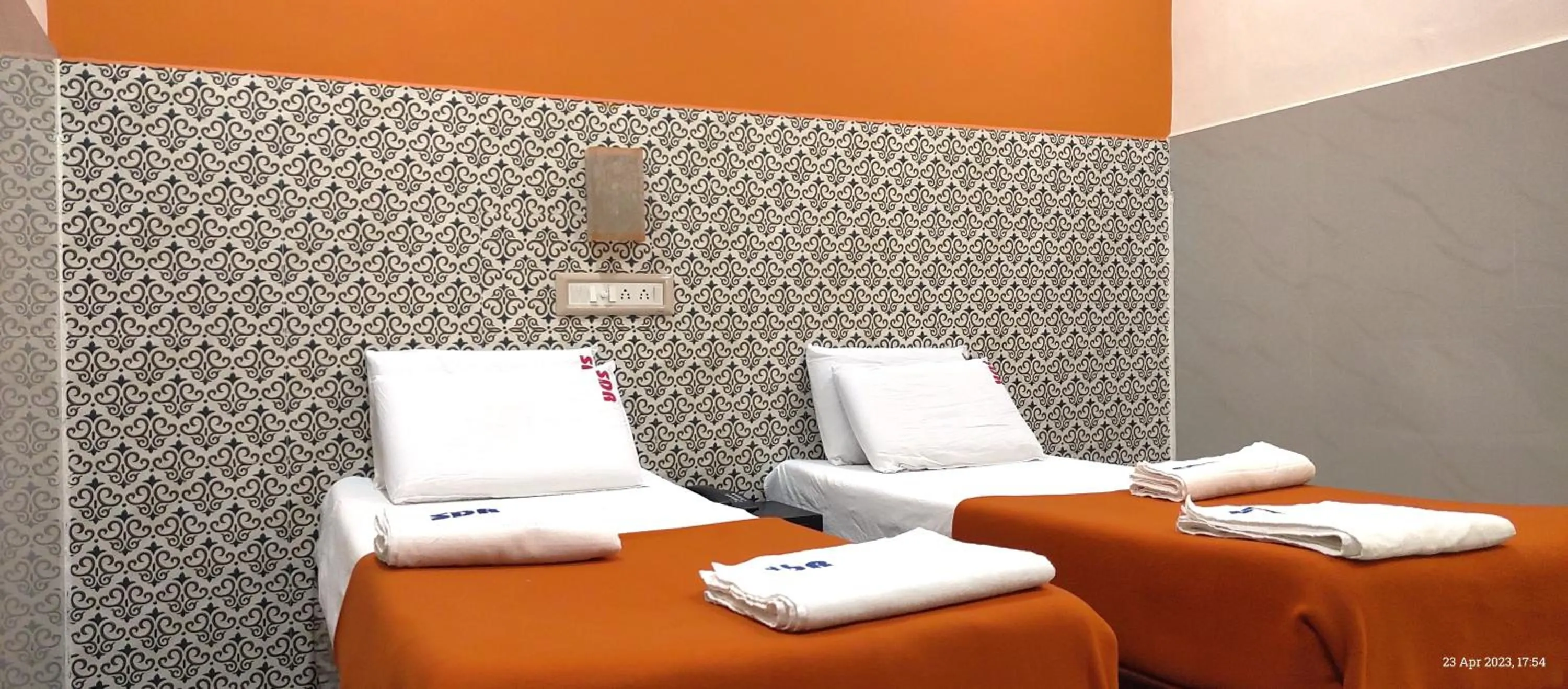 Bedroom in Sarovara Deluxe Rooms