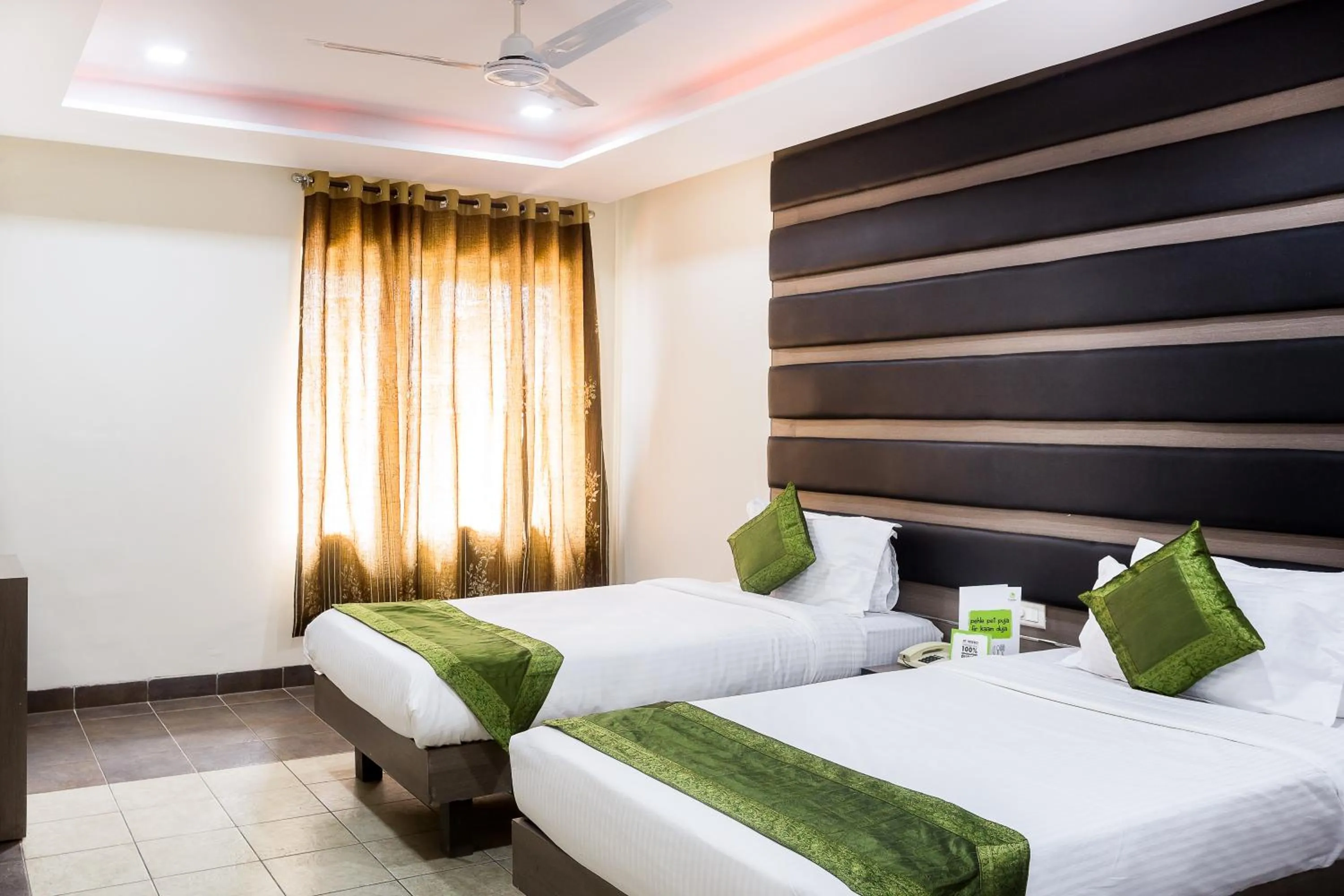 Bedroom, Bed in Treebo Fort Club