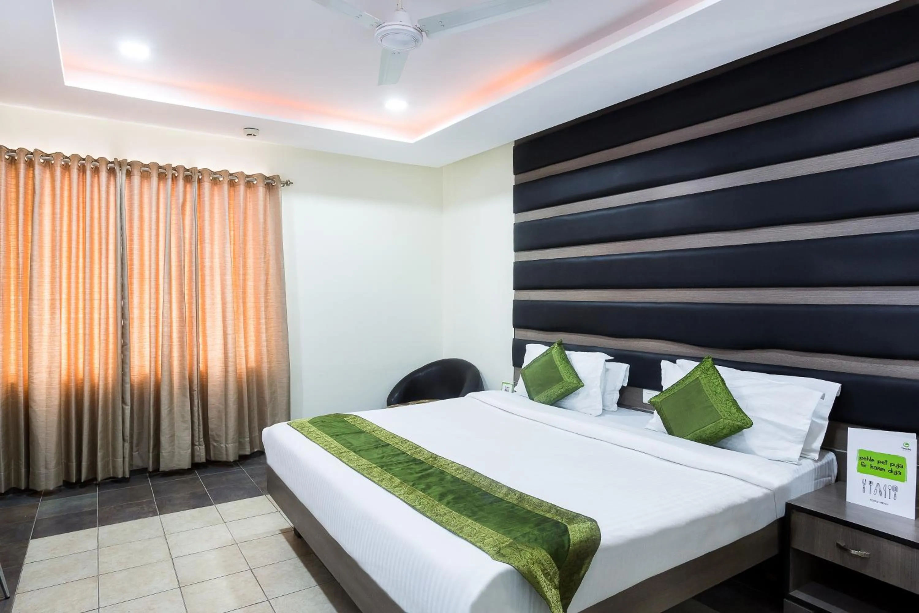 Bedroom, Bed in Treebo Fort Club