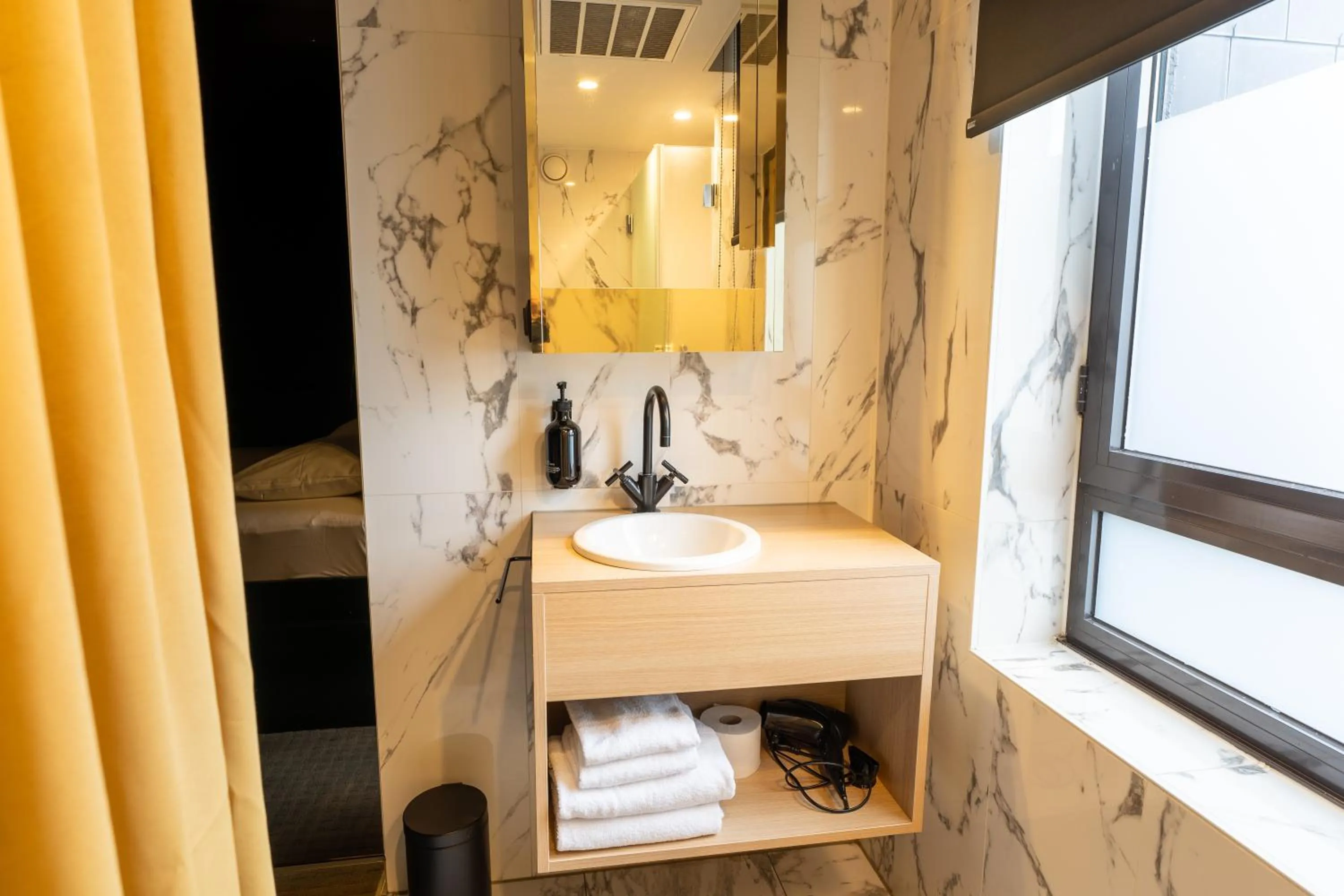 Bathroom in YUP Hotel