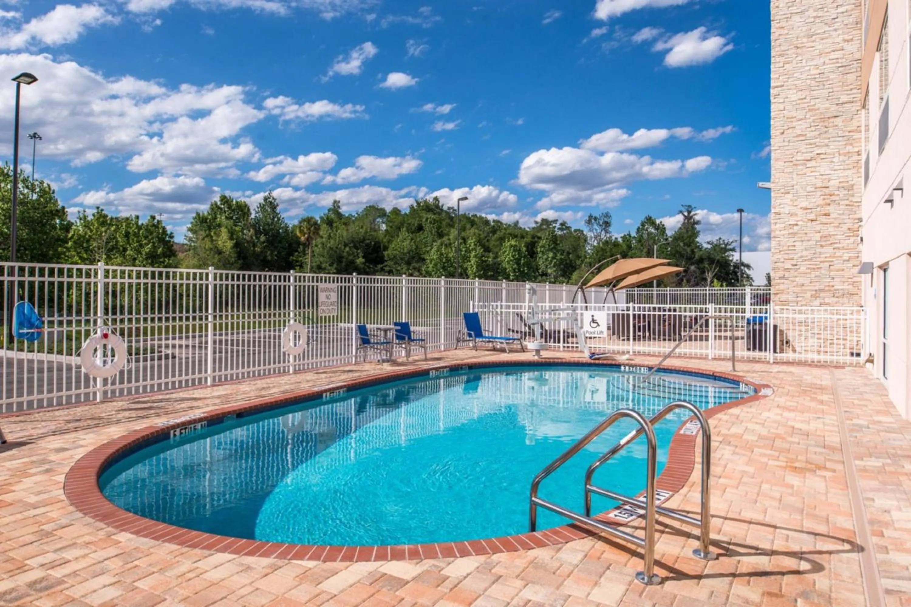 Swimming pool in Holiday Inn Express & Suites - Tampa North - Wesley Chapel by IHG