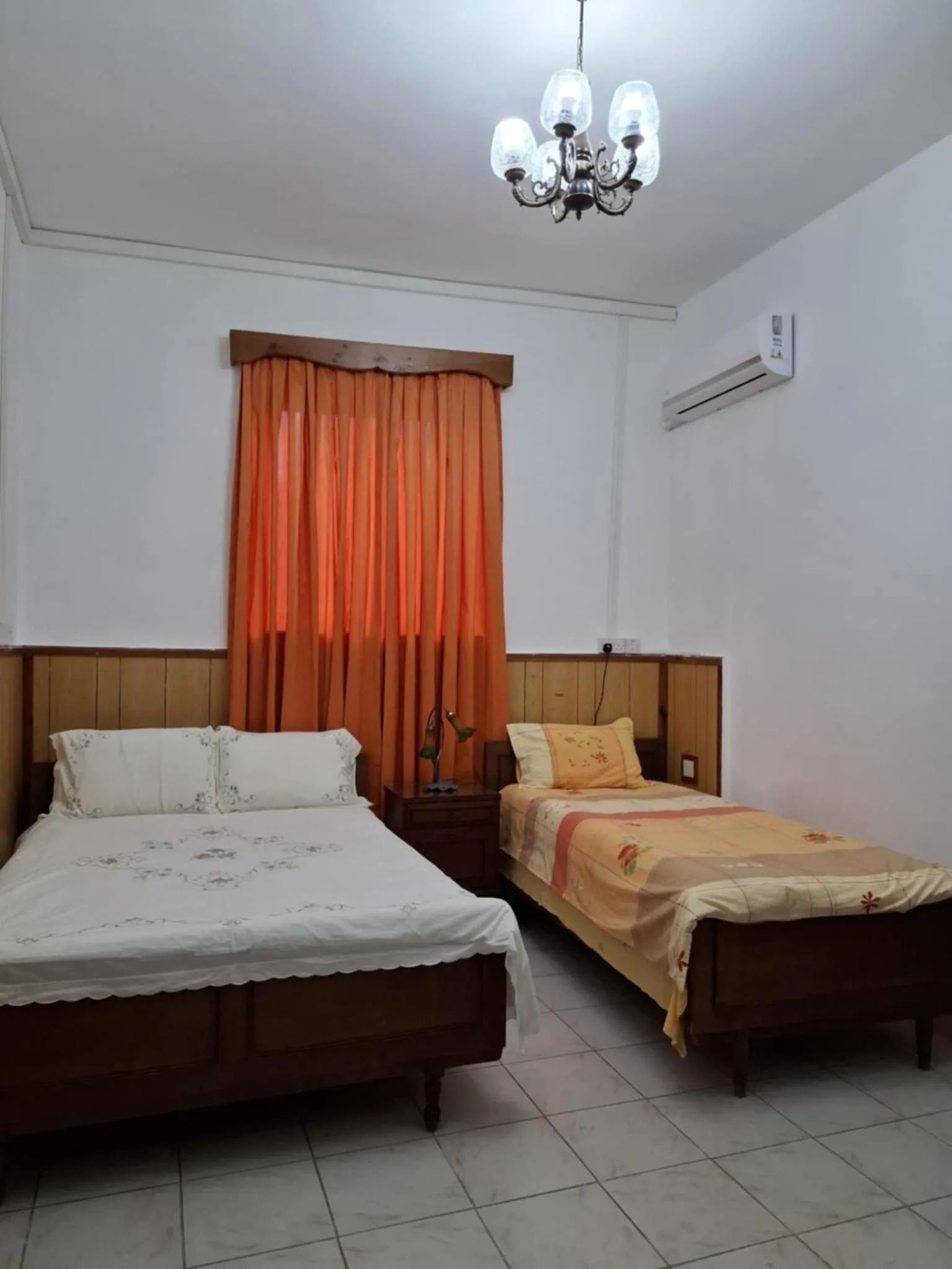 Bed in Mystery Garden Guest House