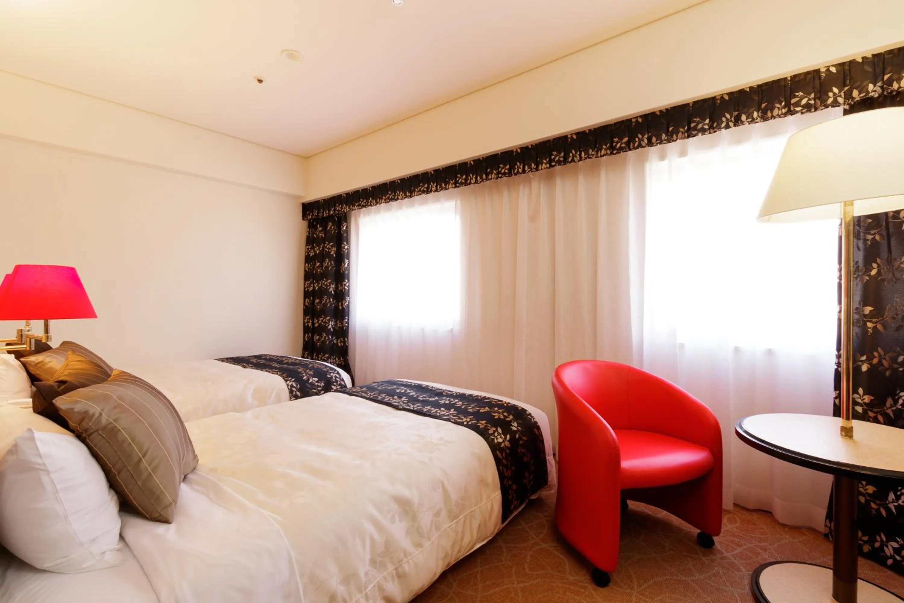 Photo of the whole room, Bed in The Celecton Fukushima