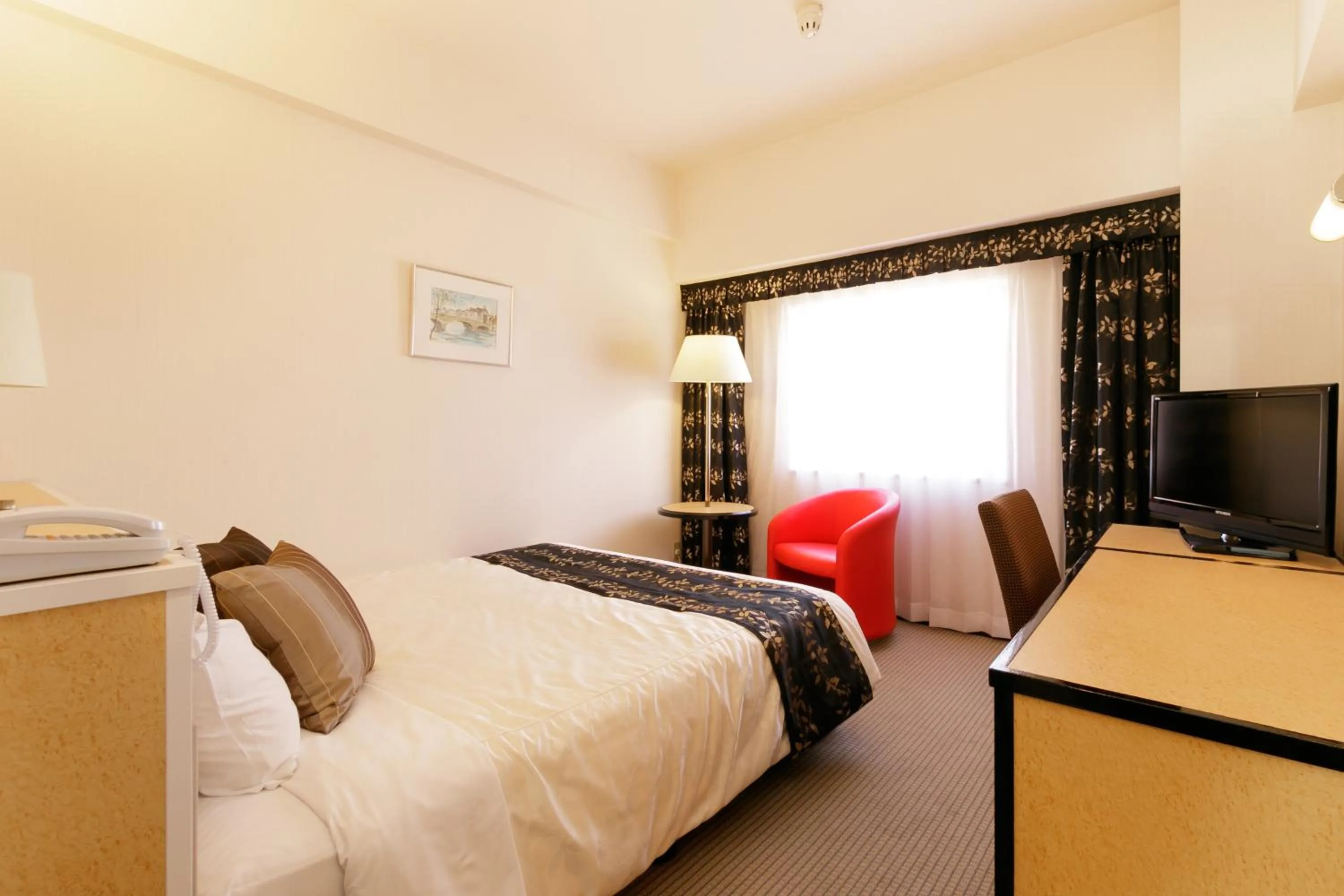 Photo of the whole room, Bed in The Celecton Fukushima