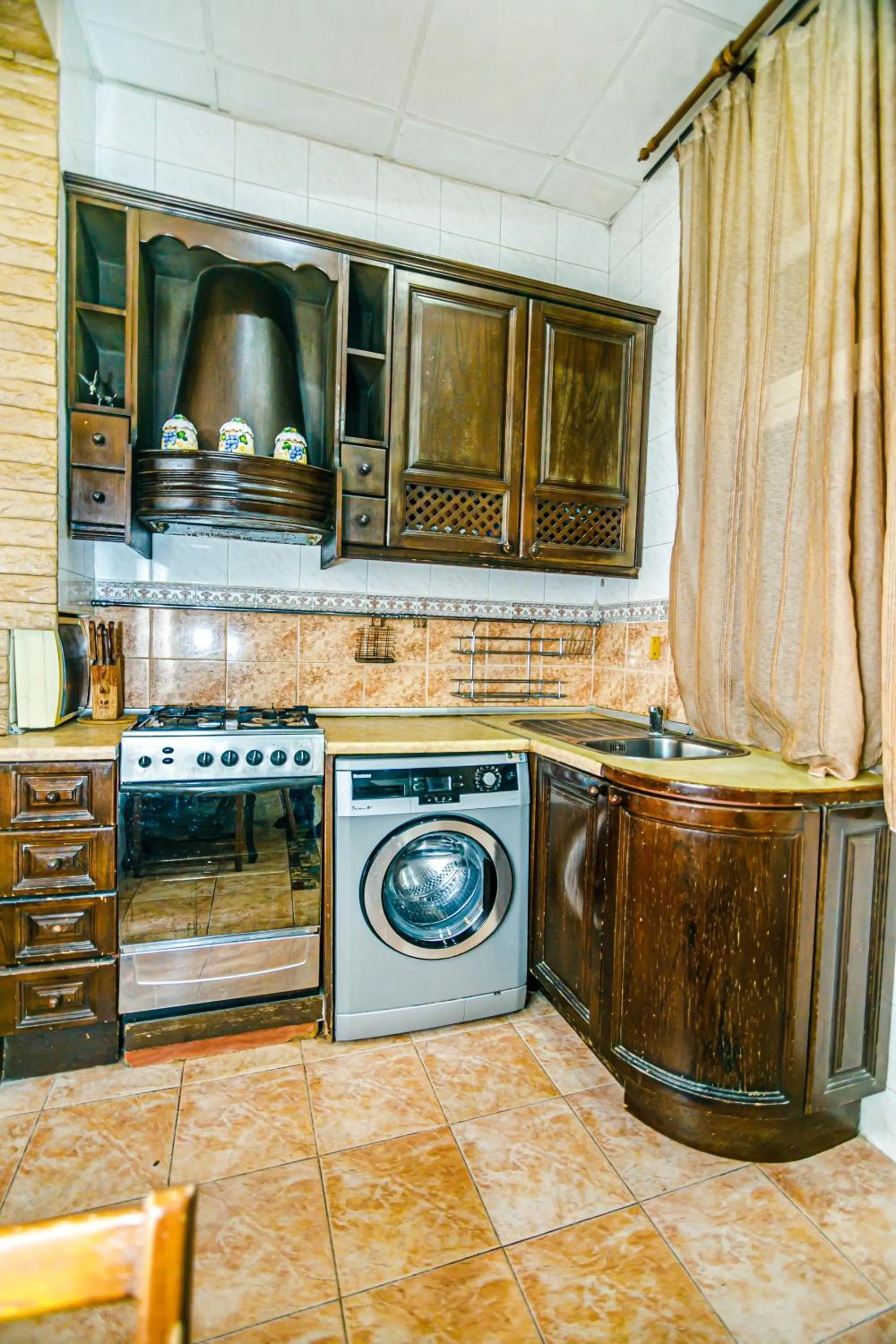 kitchen in Monolit Apartment