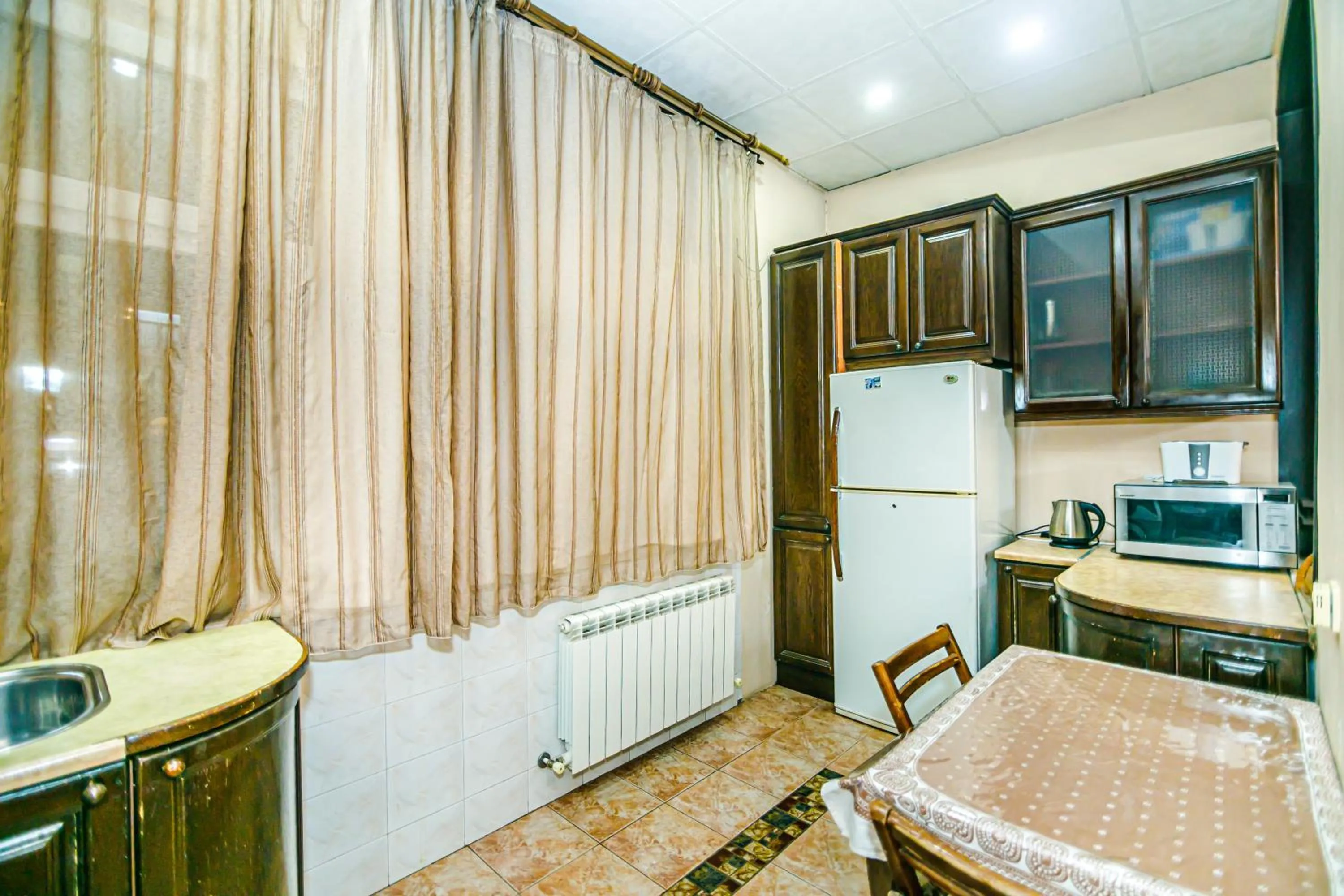 kitchen in Monolit Apartment