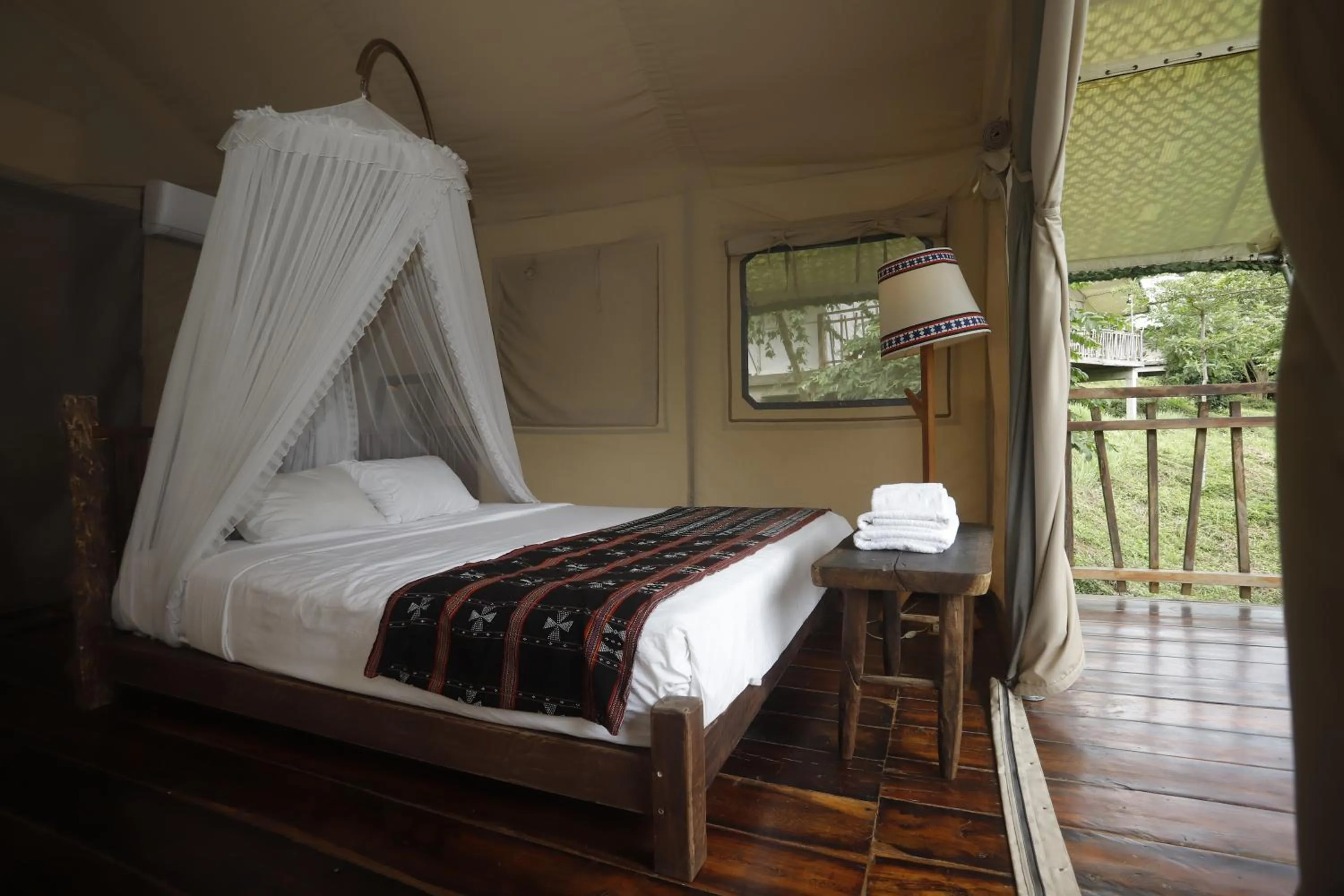 Bed in Lak Tented Camp