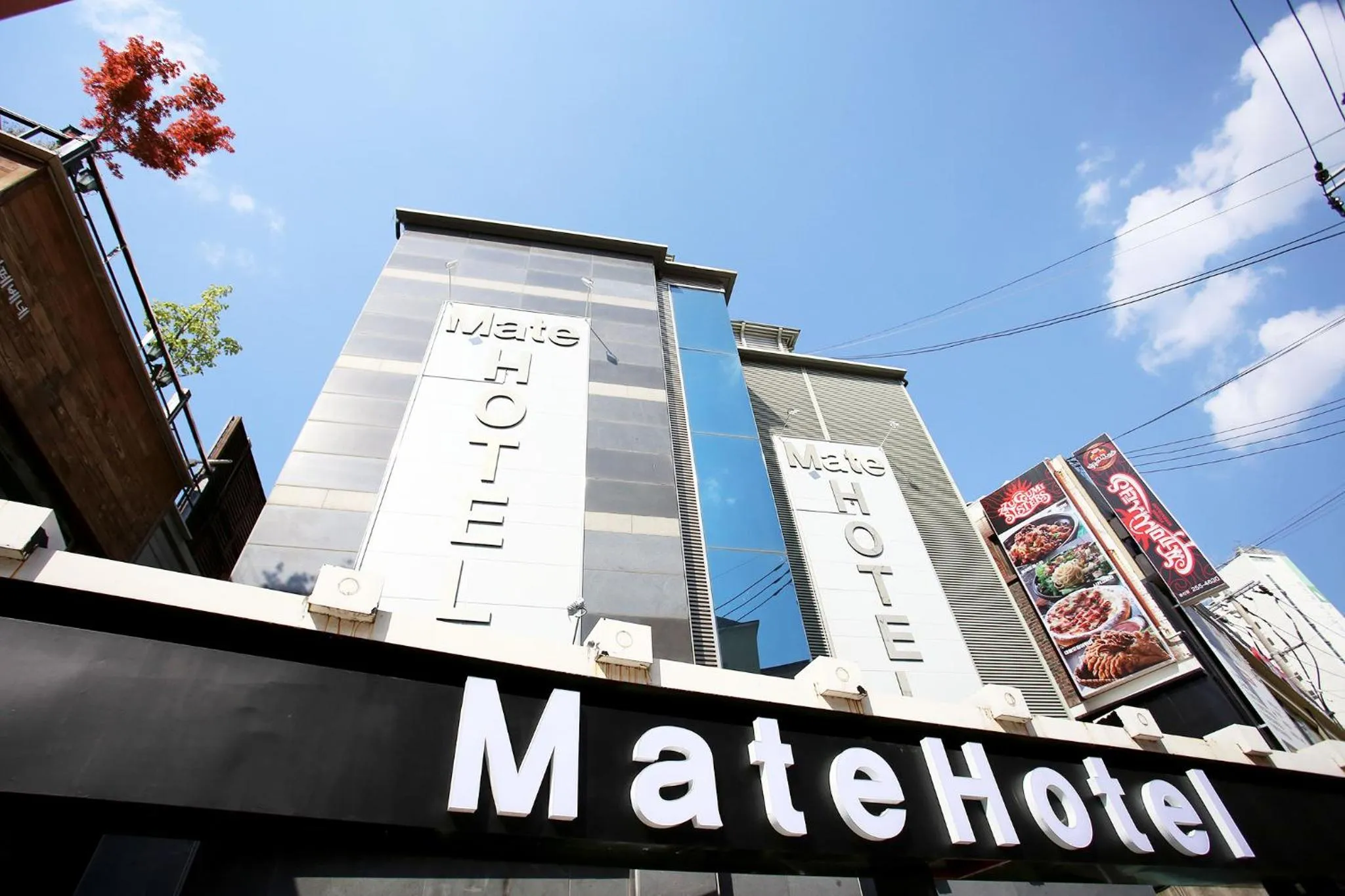 Property Logo/Sign in Mate Hotel