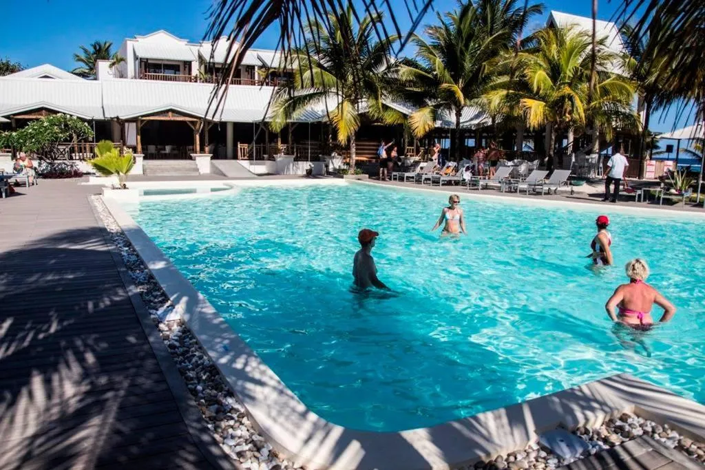 People in Le Peninsula Bay Beach Resort & Spa