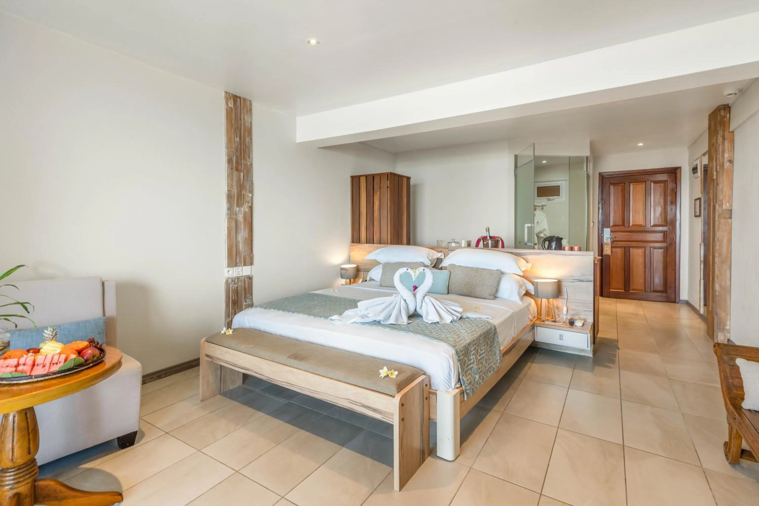 Bed in Le Peninsula Bay Beach Resort & Spa