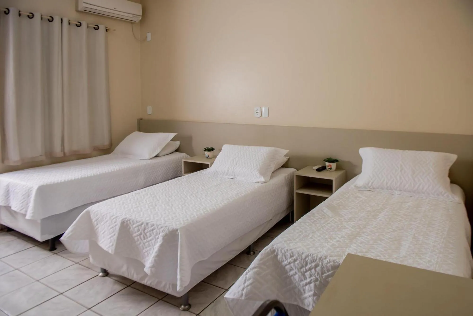 Bed in Hotel Tropical Garden