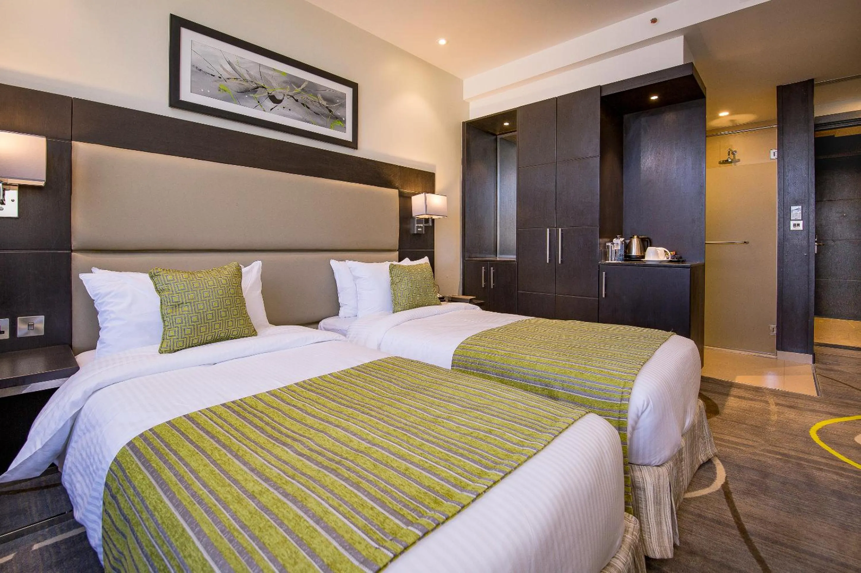 Bed in Royal Tulip Canaan Nairobi