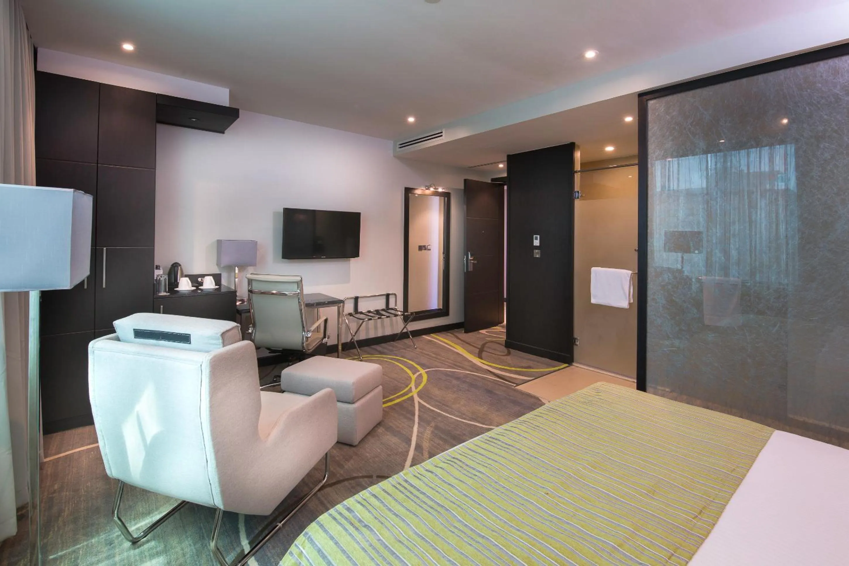 Photo of the whole room, Bed in Royal Tulip Canaan Nairobi