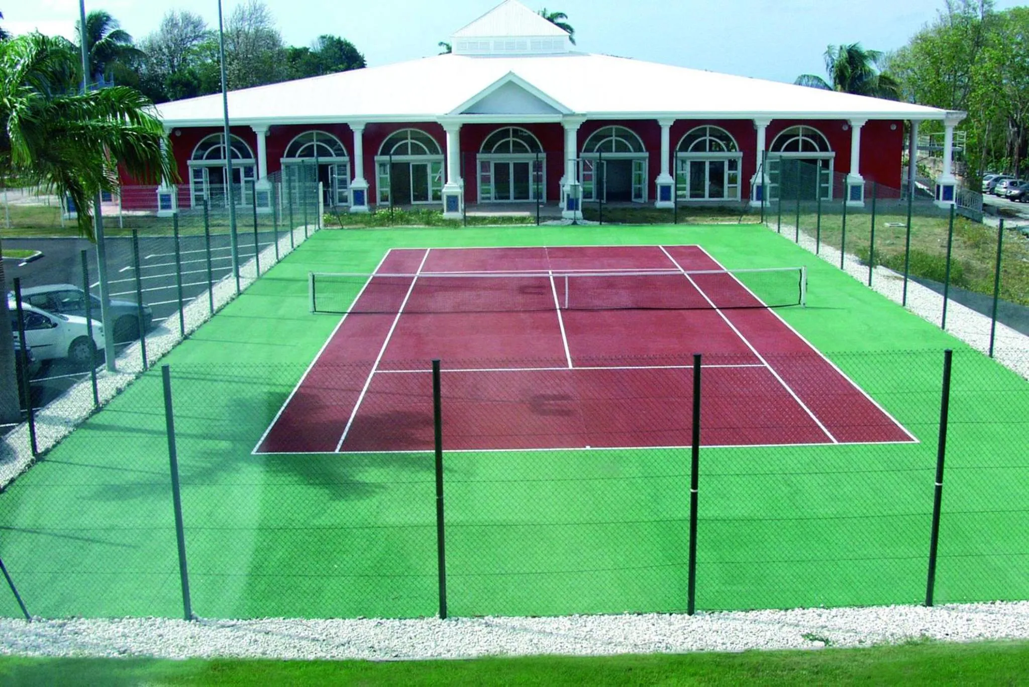 Tennis court in Appartement à la Résidence LA PLANTATION RESORT and SPA