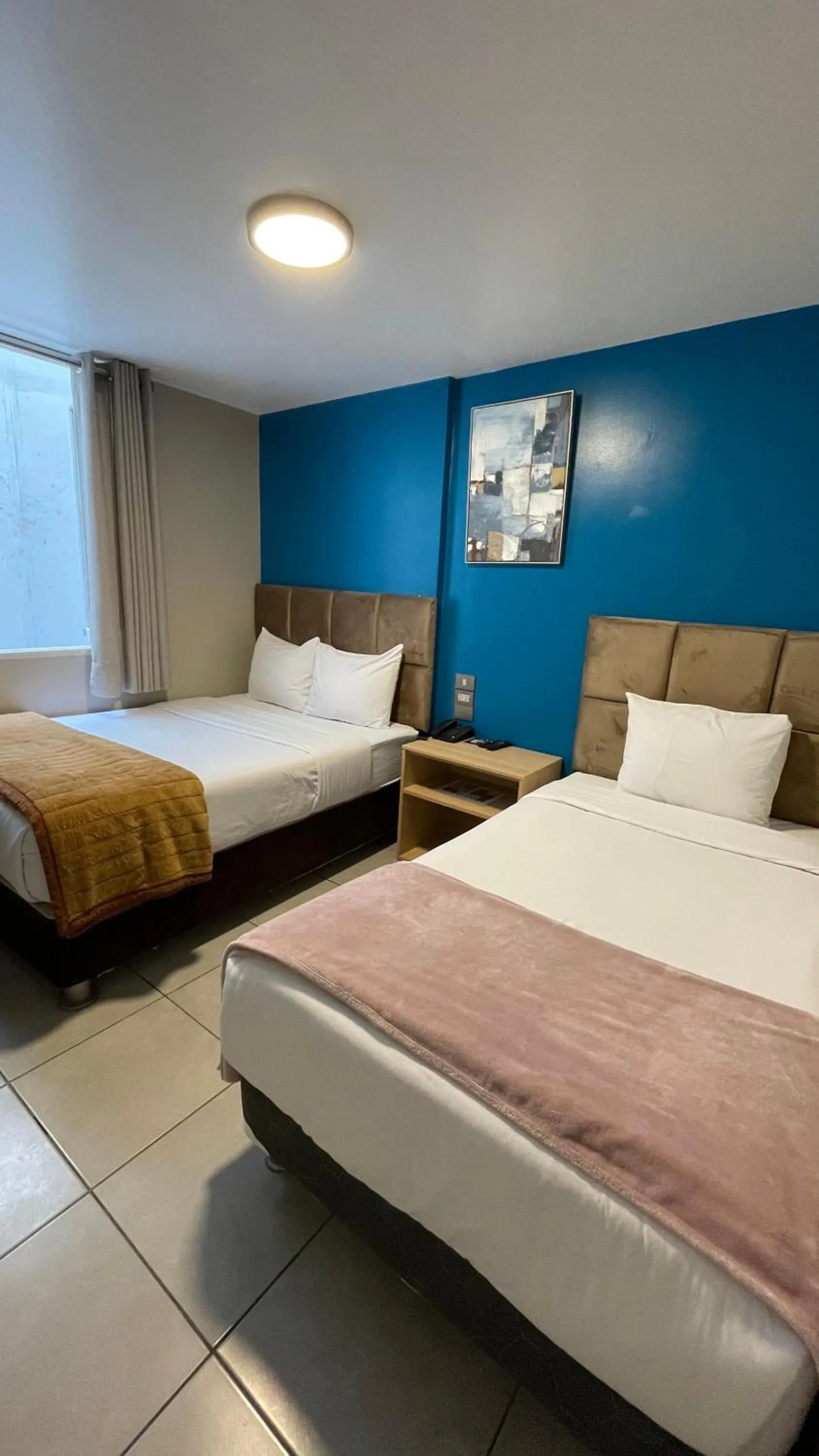 Bed in Residencial Alfa Hotel