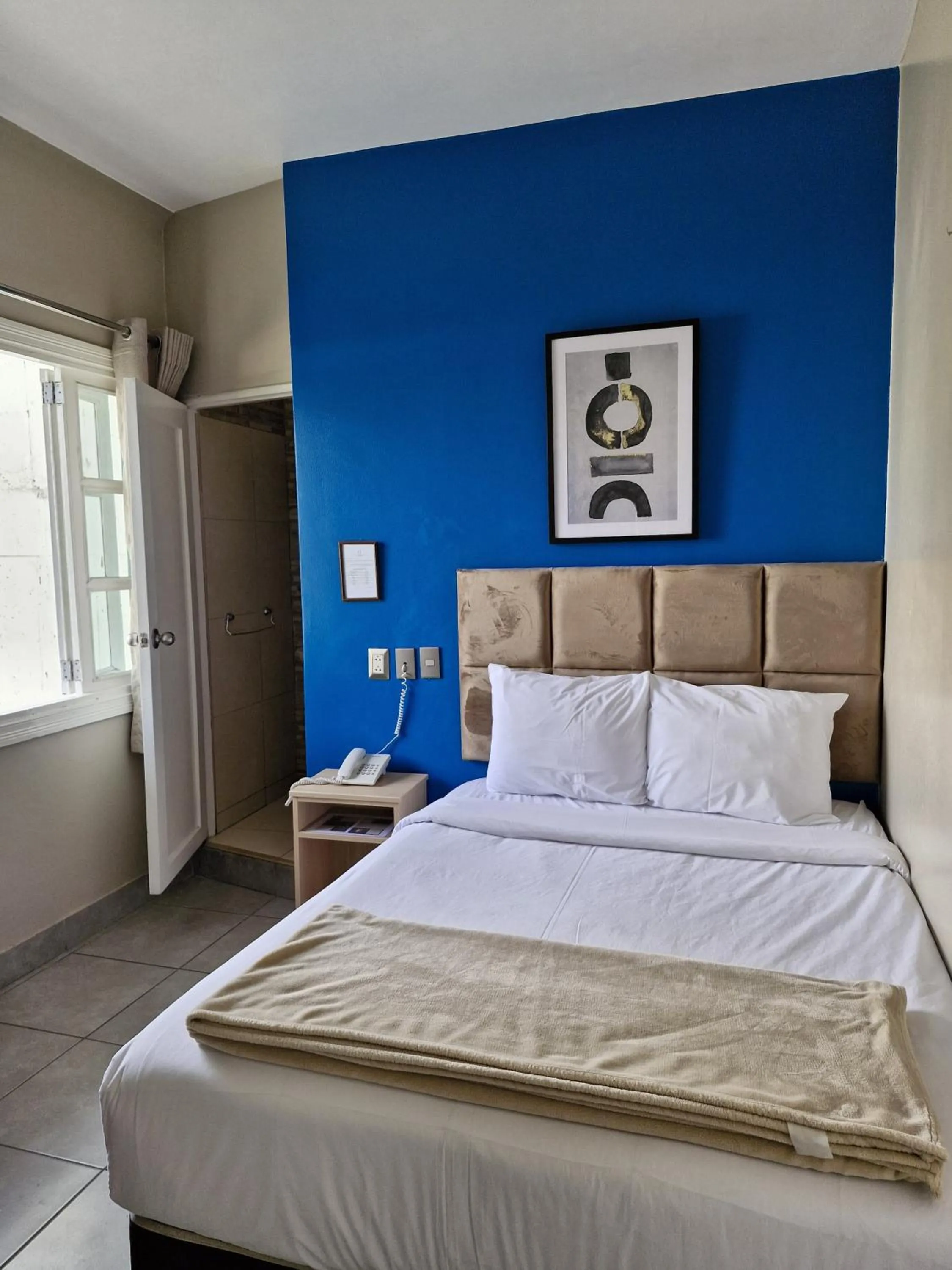 Bed in Residencial Alfa Hotel