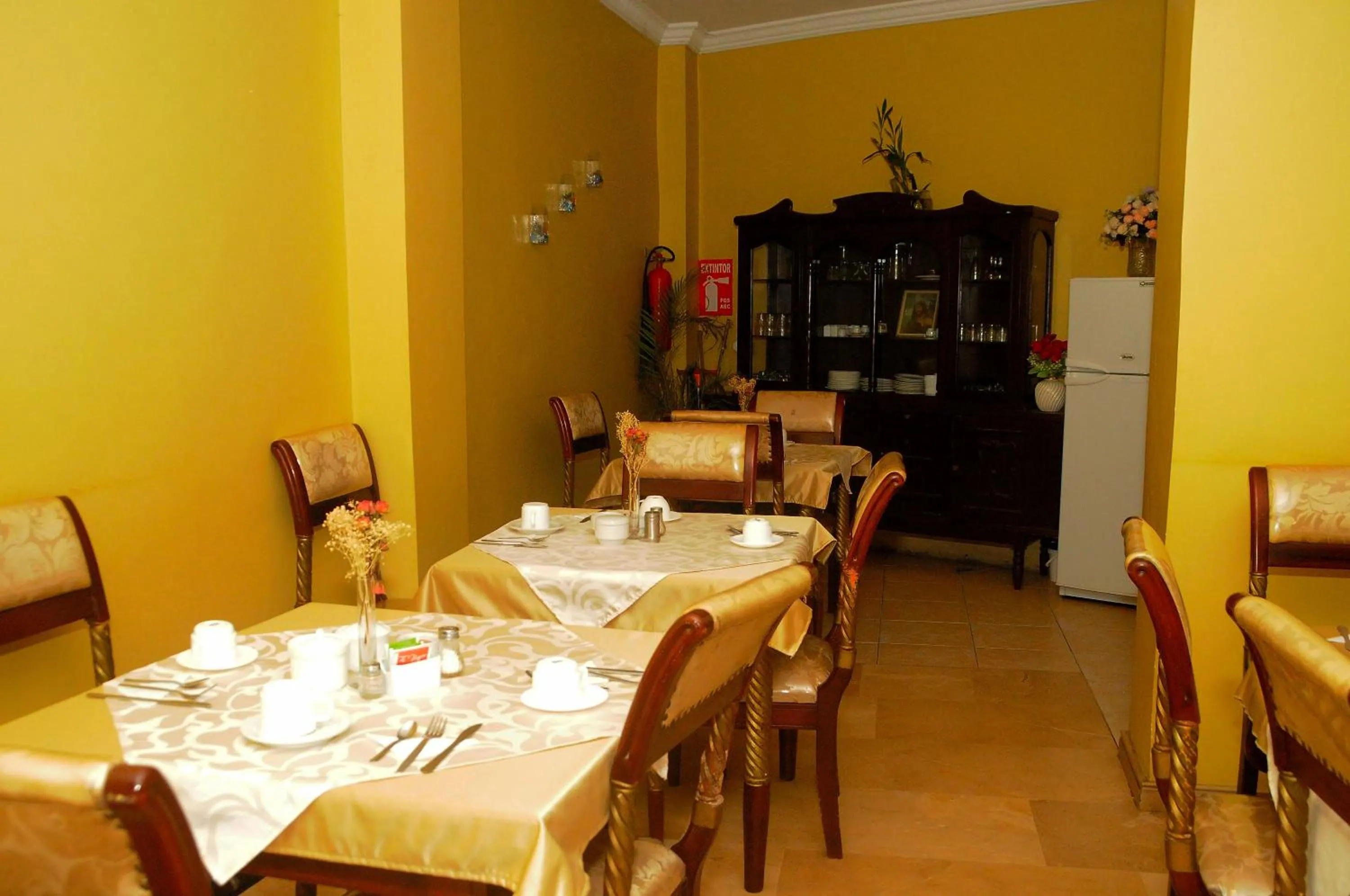 Dining area in Colony Inn Hotel