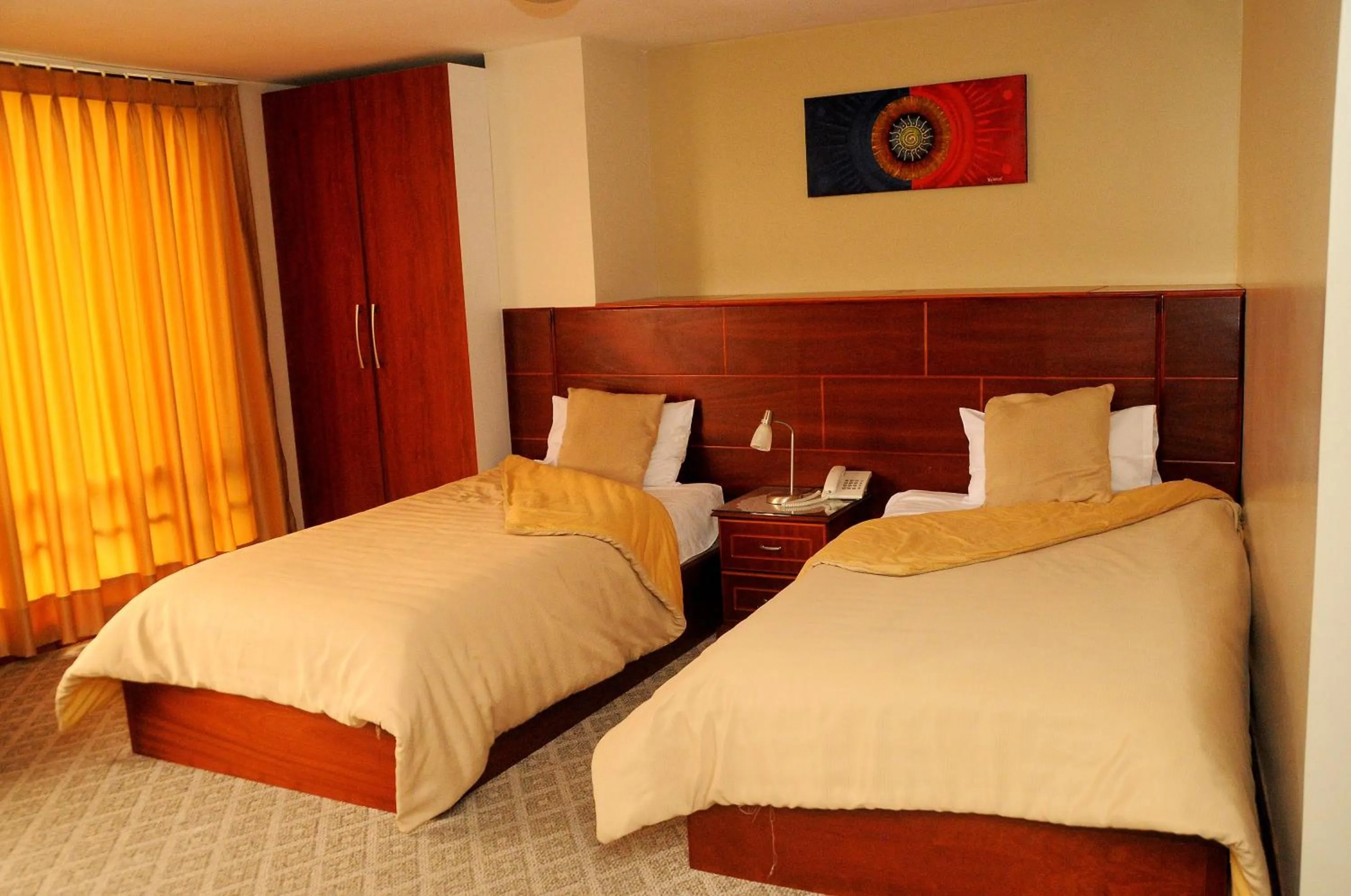 Bedroom, Bed in Colony Inn Hotel