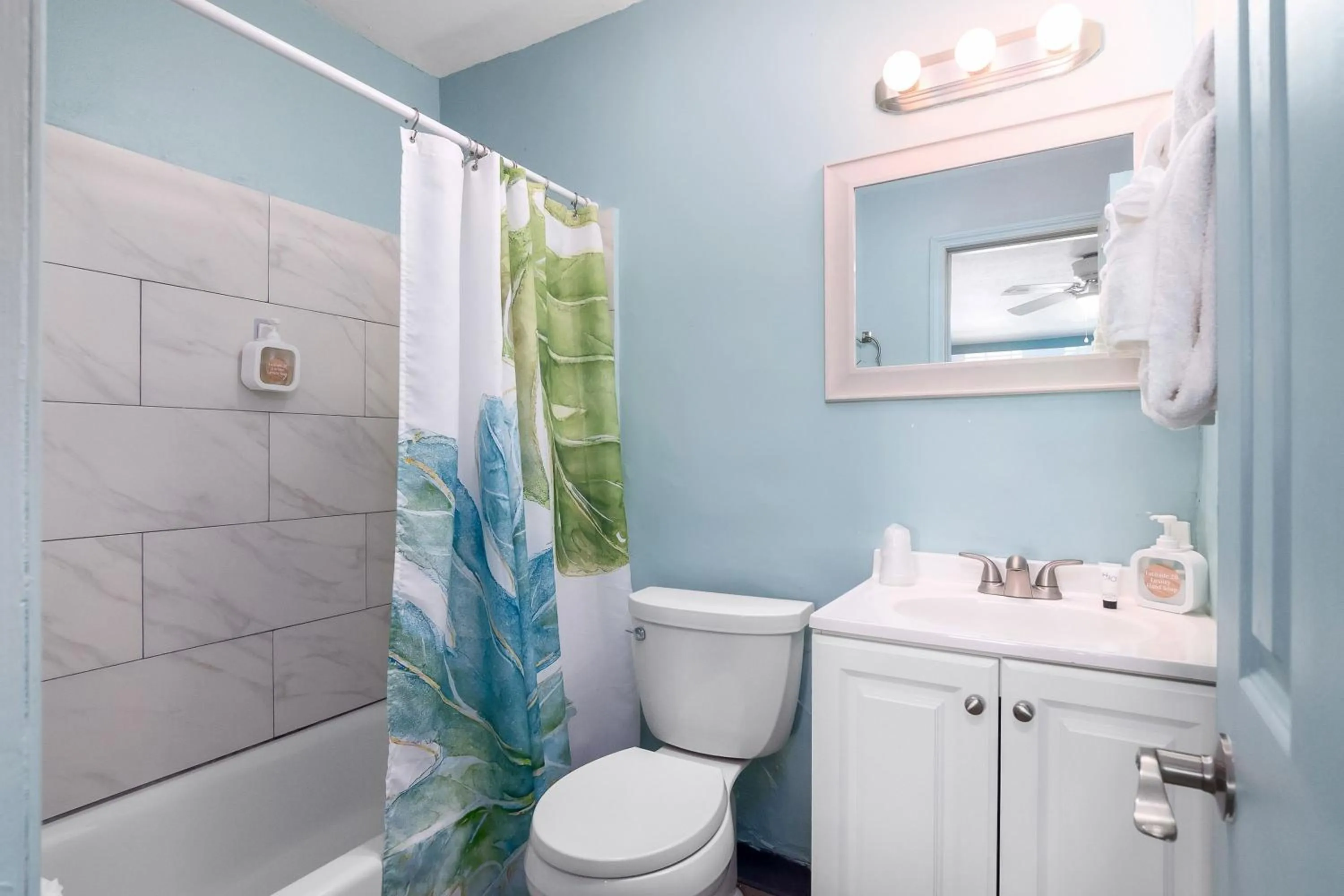 Shower in Latitude 26 Waterfront Boutique Resort - Fort Myers Beach