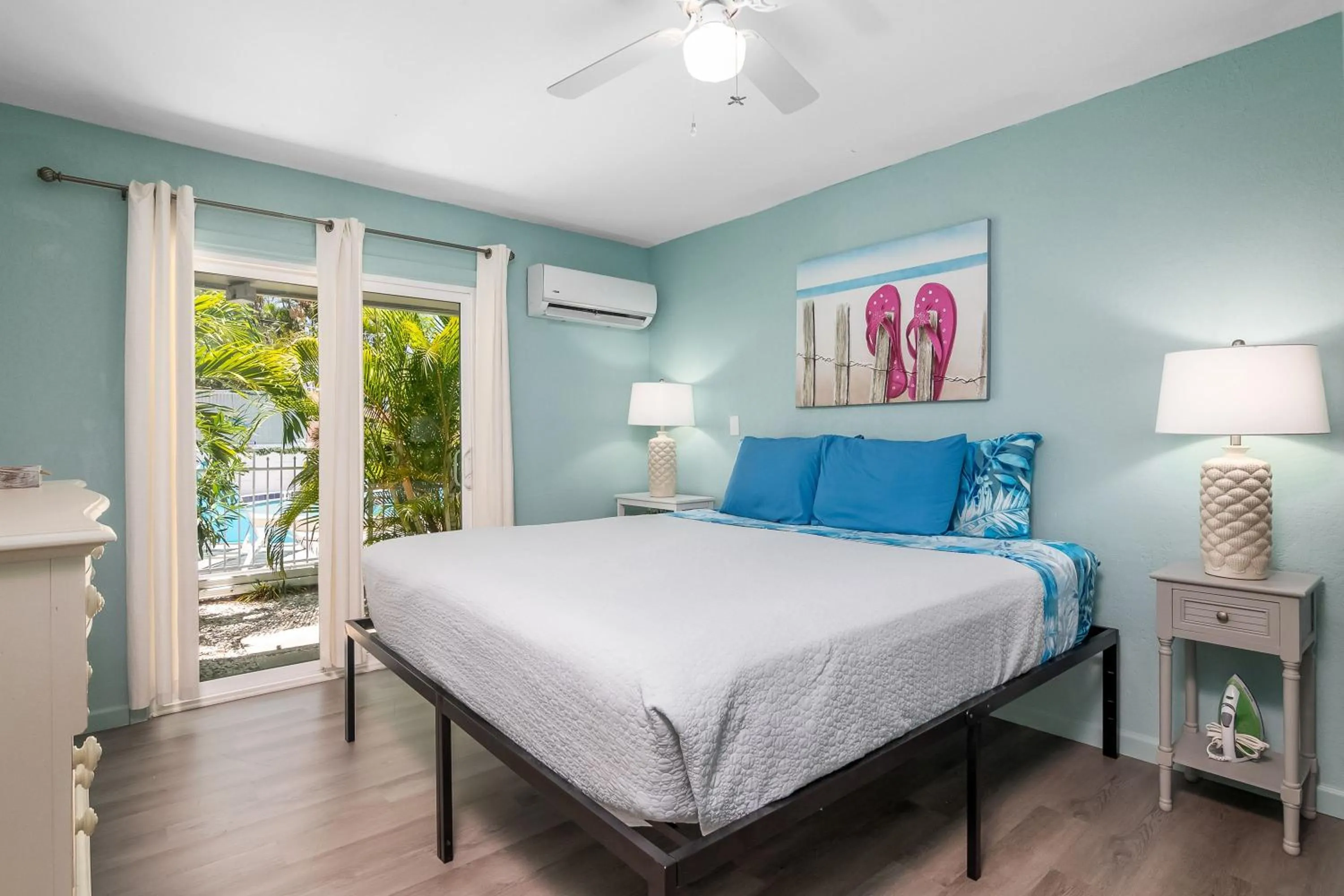 Bed in Latitude 26 Waterfront Boutique Resort - Fort Myers Beach