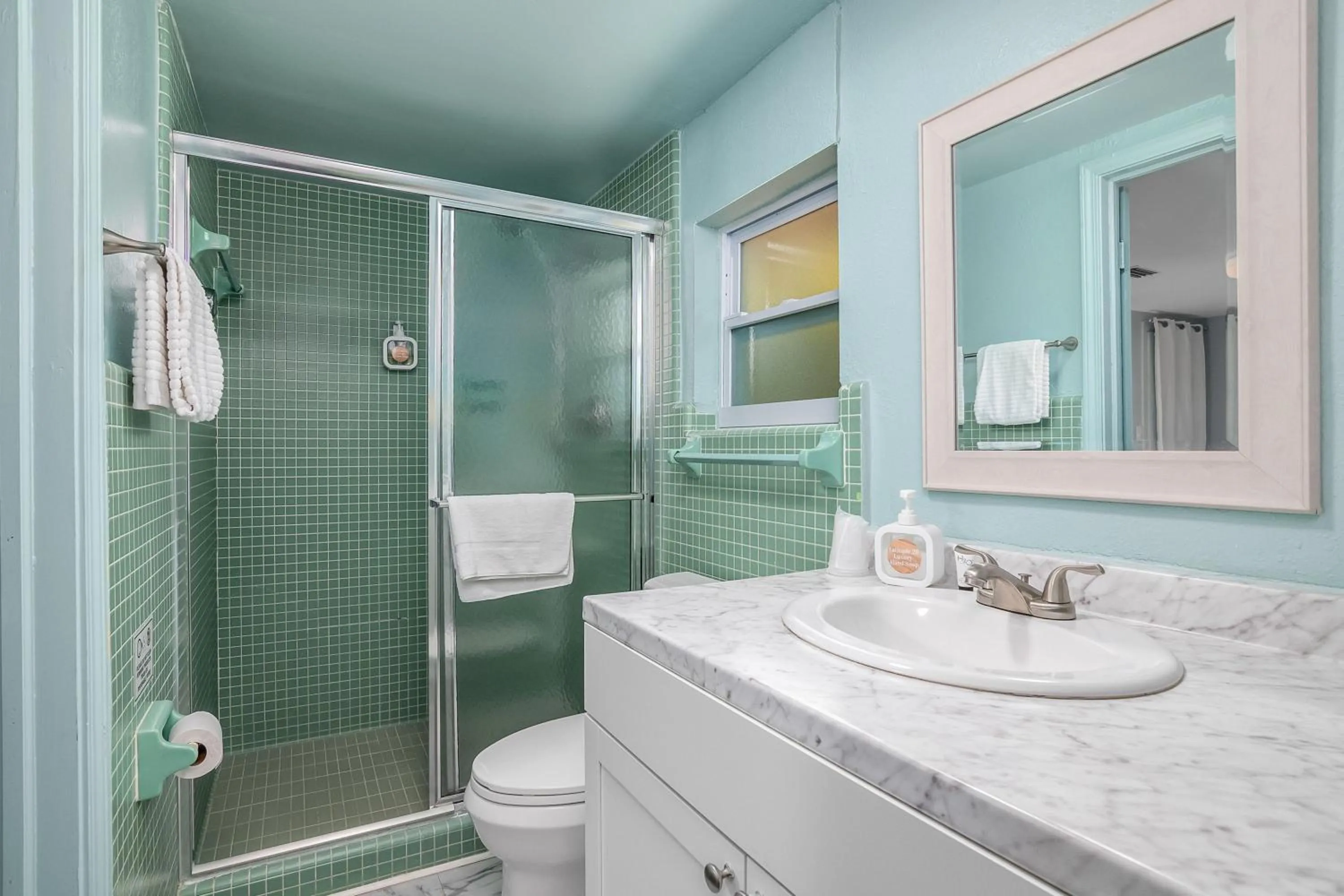 Shower in Latitude 26 Waterfront Boutique Resort - Fort Myers Beach