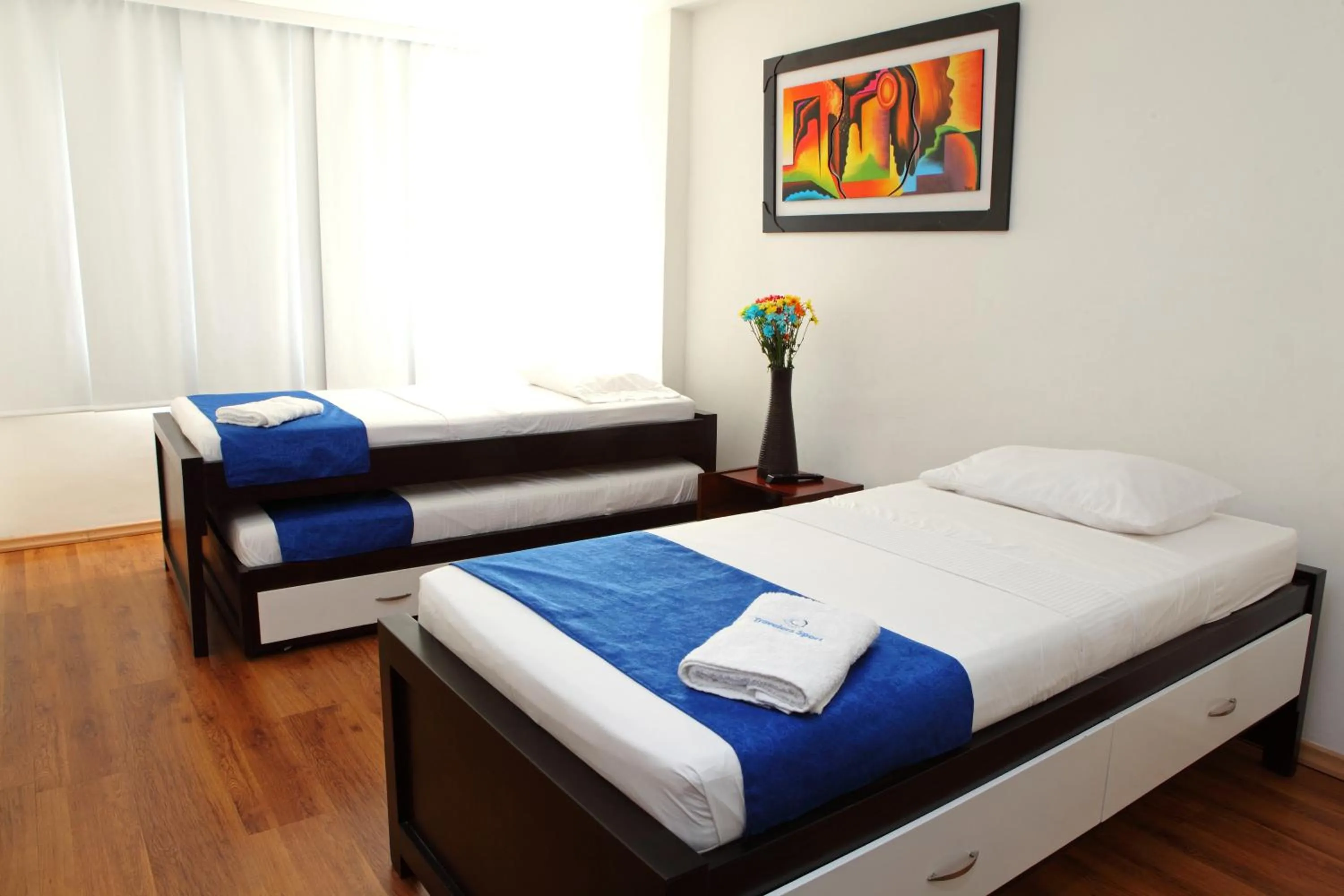 Toilet, Bed in Hotel Travelers Sport